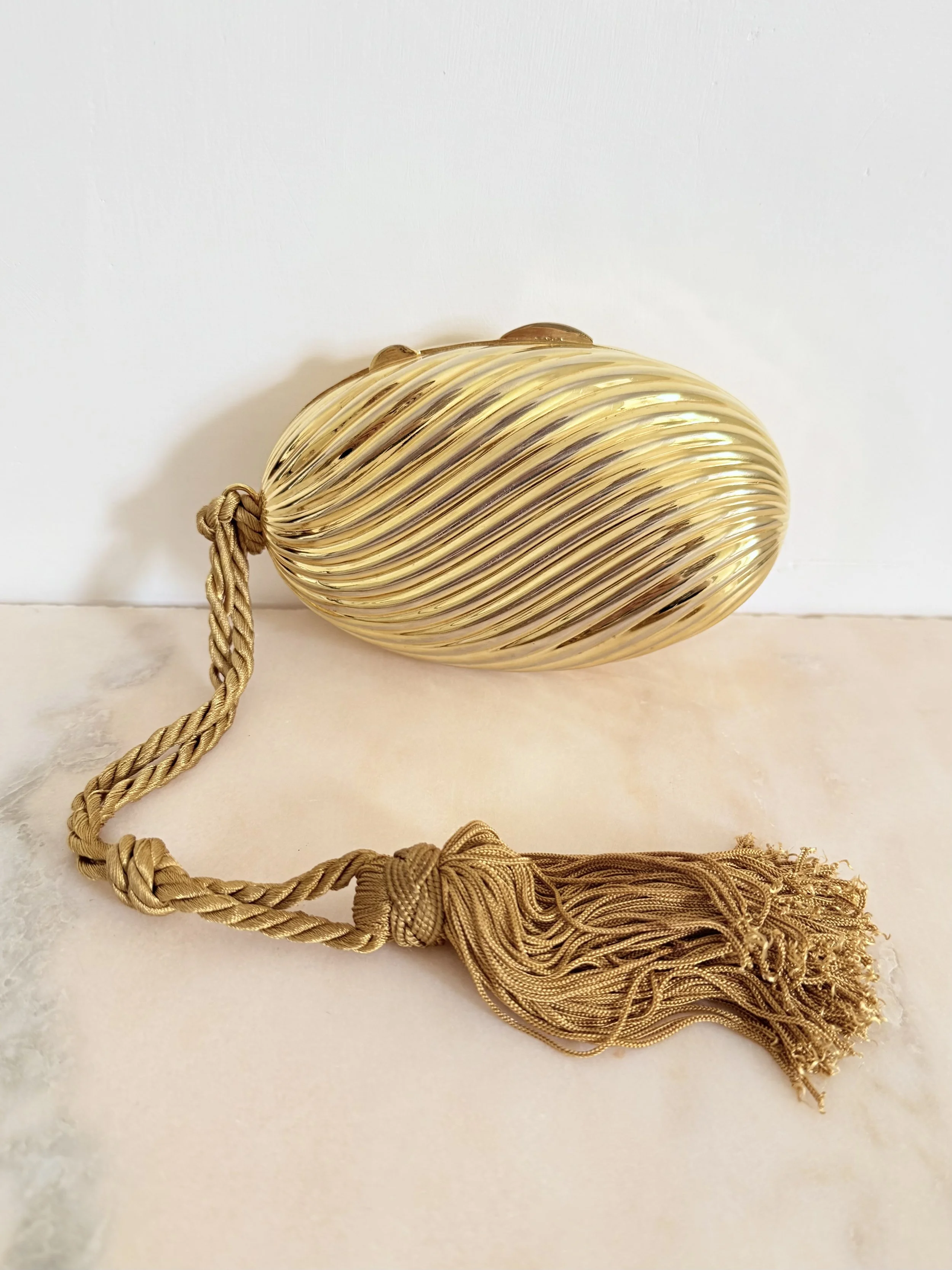 VALIGERIA NAPOLEON GOLD TASSEL CLUTCH 1.jpeg