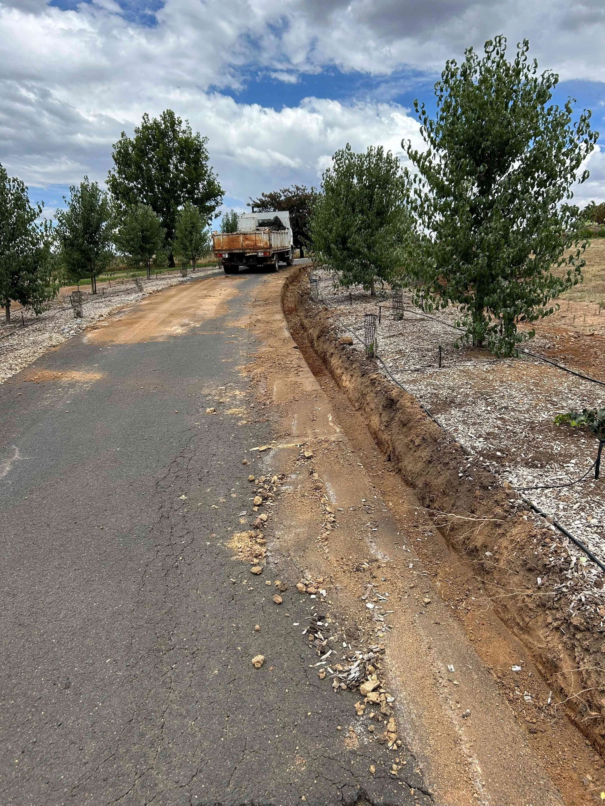 Completed drainage system improving water flow and site functionality on civil construction project