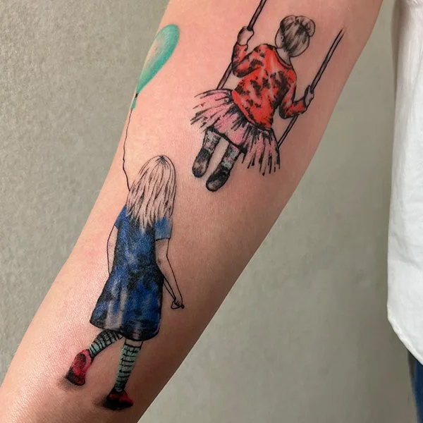 tatovering-fargetatovering-arm-to-jenter.jpg