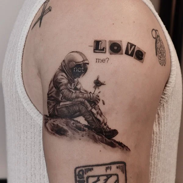 tatovering-mikrorealisme-overarm-astronaut.jpg