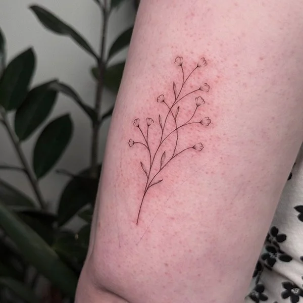 tatovering-sma-tatoveringer-arm-blomster.jpg
