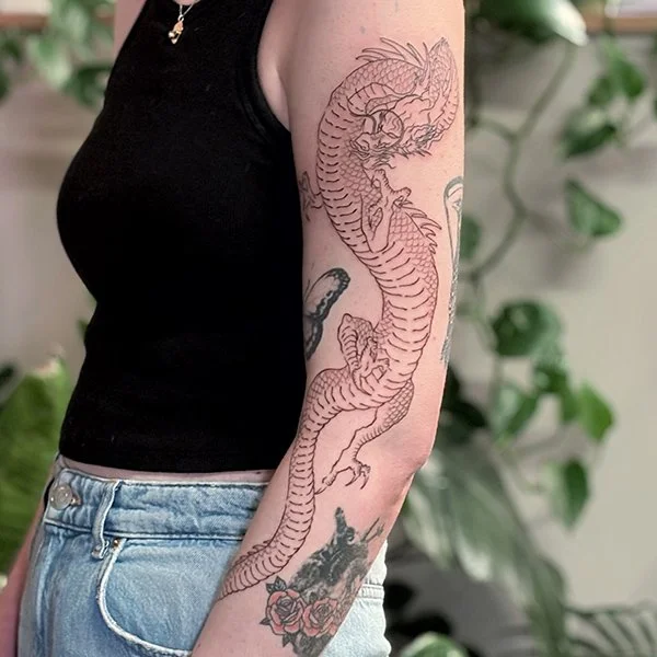 oslo-tattoo-artist-nina-tatovering-arm-drage