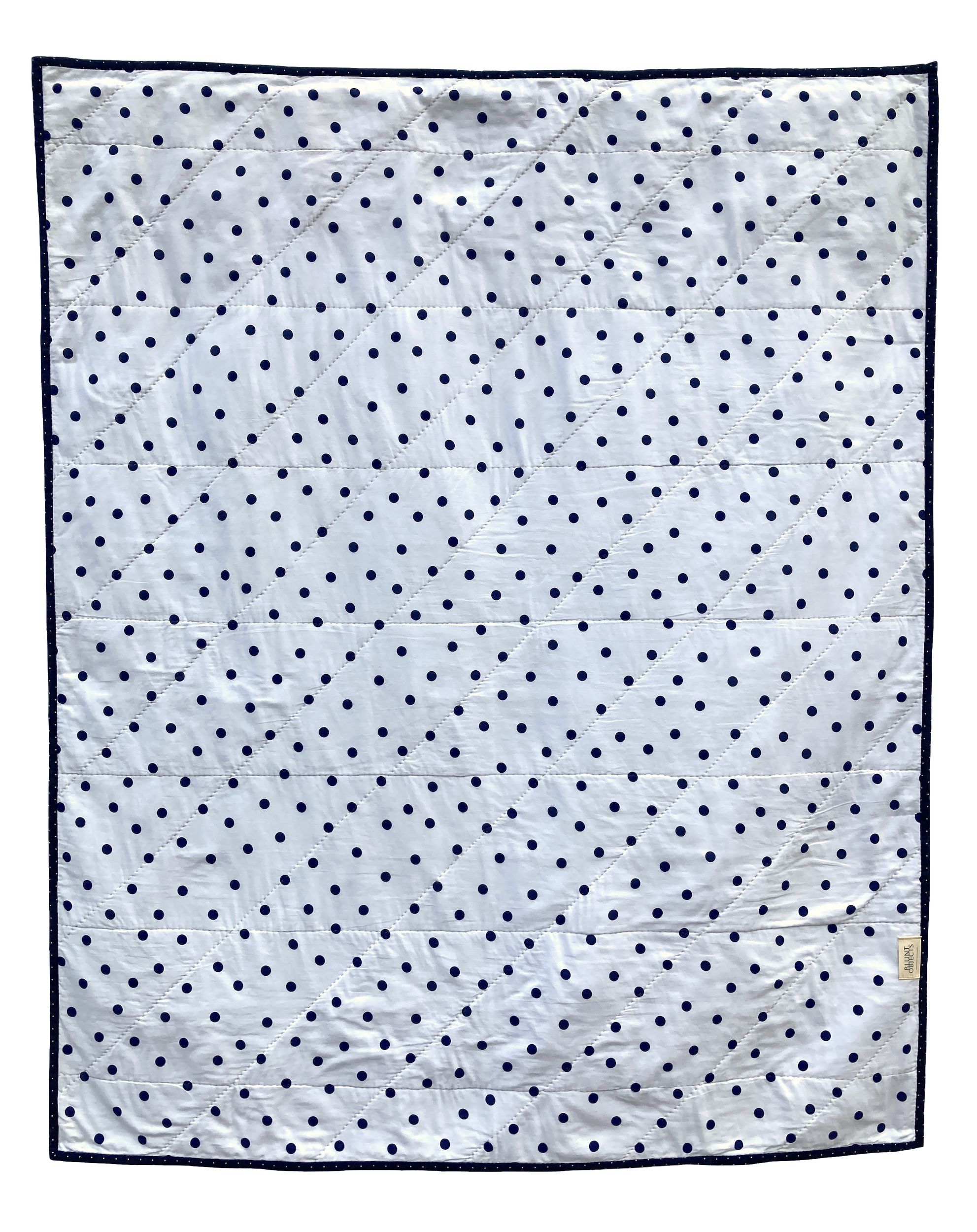 Frolic Quilt - A hand stitched Blunt Objects patchwork quilt by designer maker Carolyn Thompson