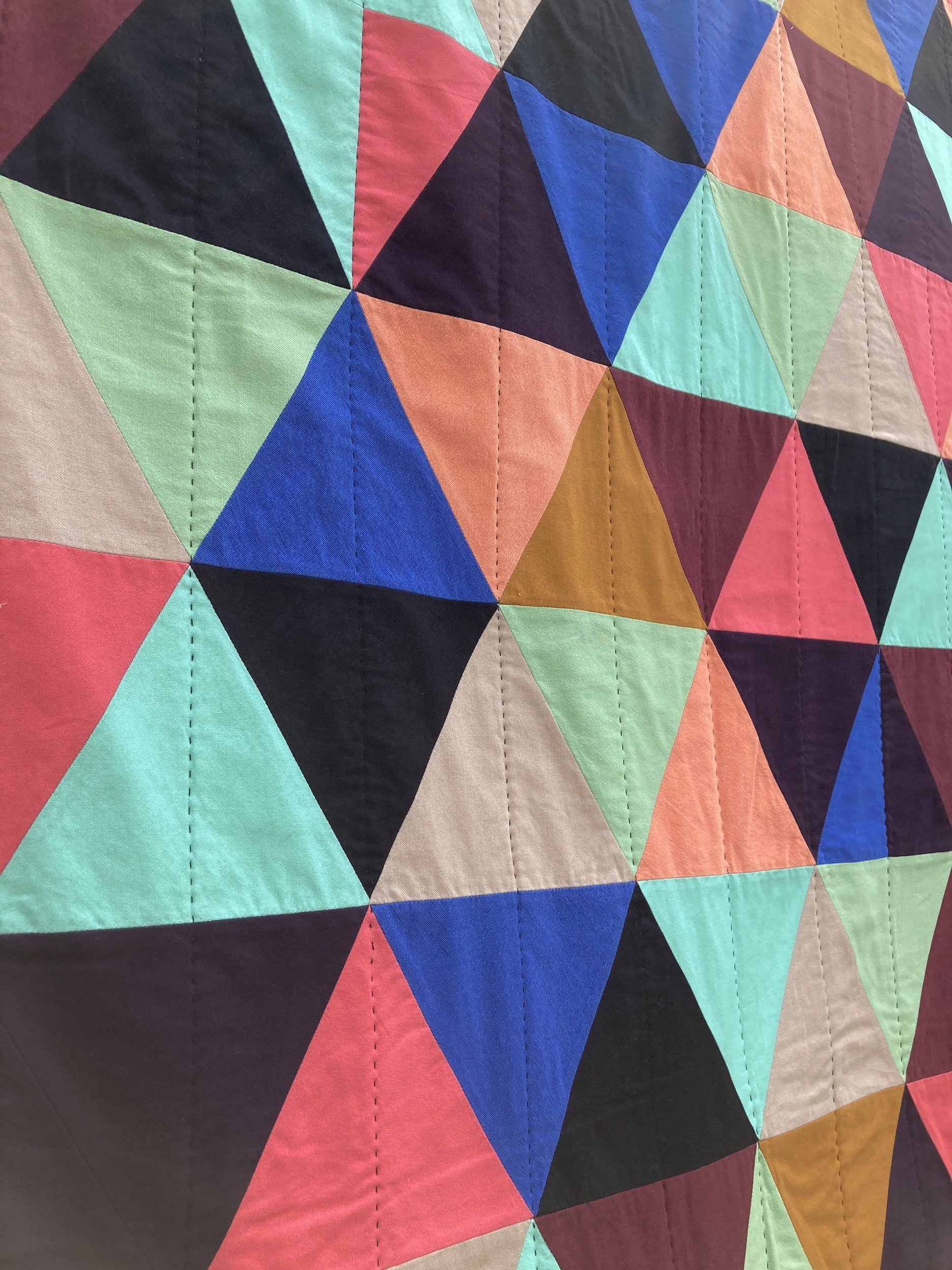 Jest - A hand stitched Blunt Objects patchwork quilt by designer maker Carolyn Thompson
