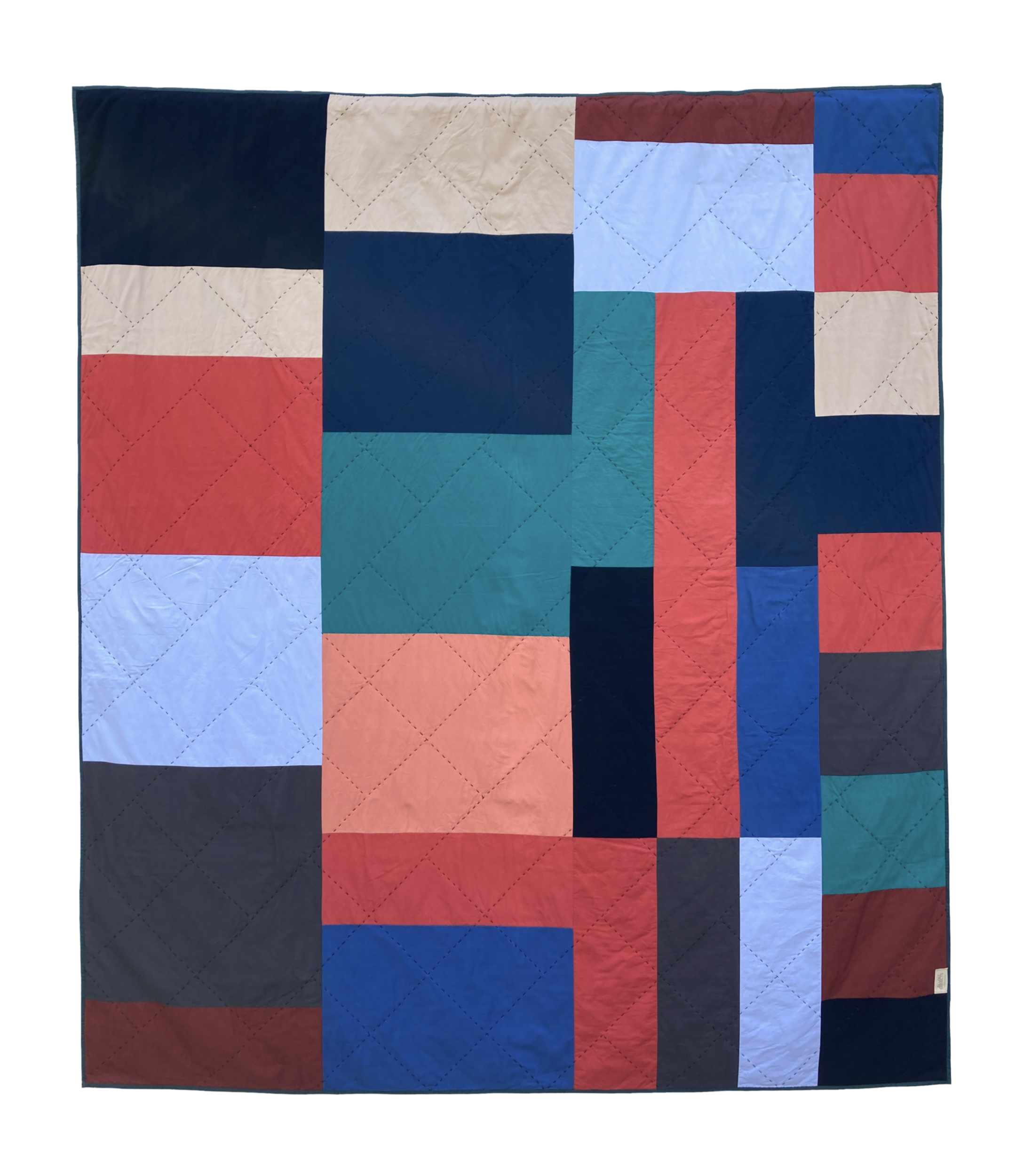 The back of Hex a hand stitched Blunt Objects patchwork quilt by designer maker Carolyn Thompson