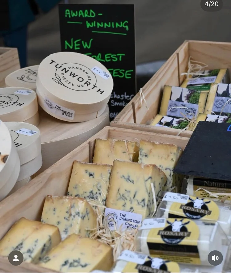 Tunworth and blue cheeses on display
