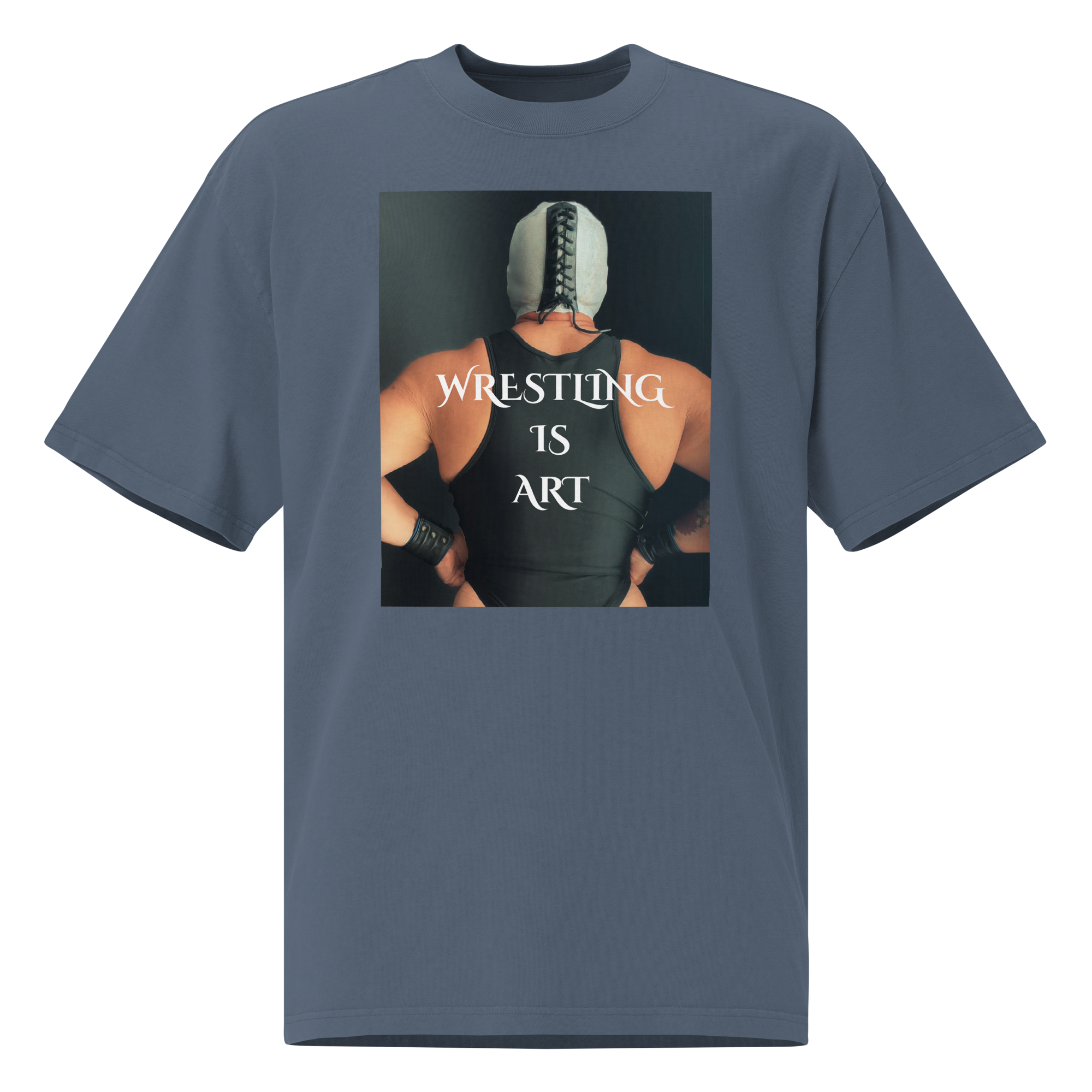 Flat lay of the Wrestling Is Art oversized tee showing the front masked wrestler graphic