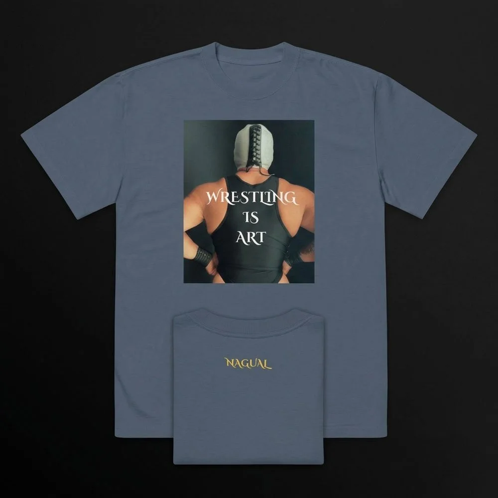 Front and back flat lay on black background showing the masked wrestler graphic and small back wordmark