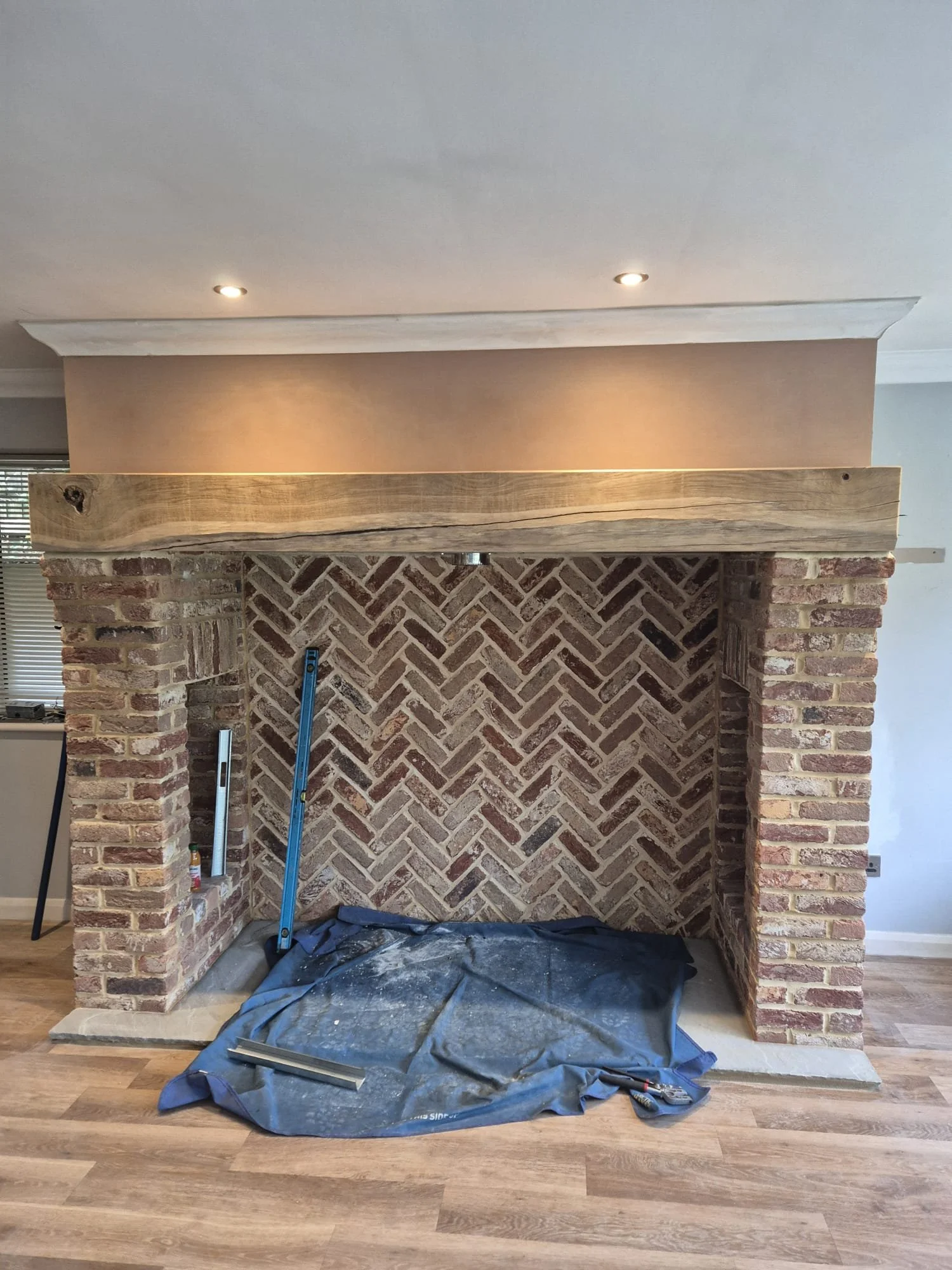 Skim newly built fireplace and added a new cornice