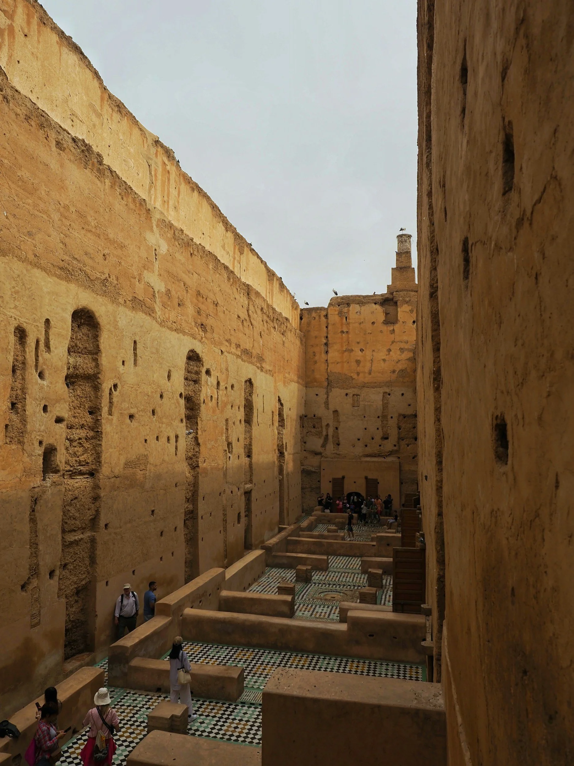 The ancient Fes medina in Morocco — setting for a Story Feast multi-course communal dinner celebrating Fassi culinary heritage, ancestral spice traditions, Moroccan cuisine, artisan producers, and curated beverages in one of the world's oldest cities