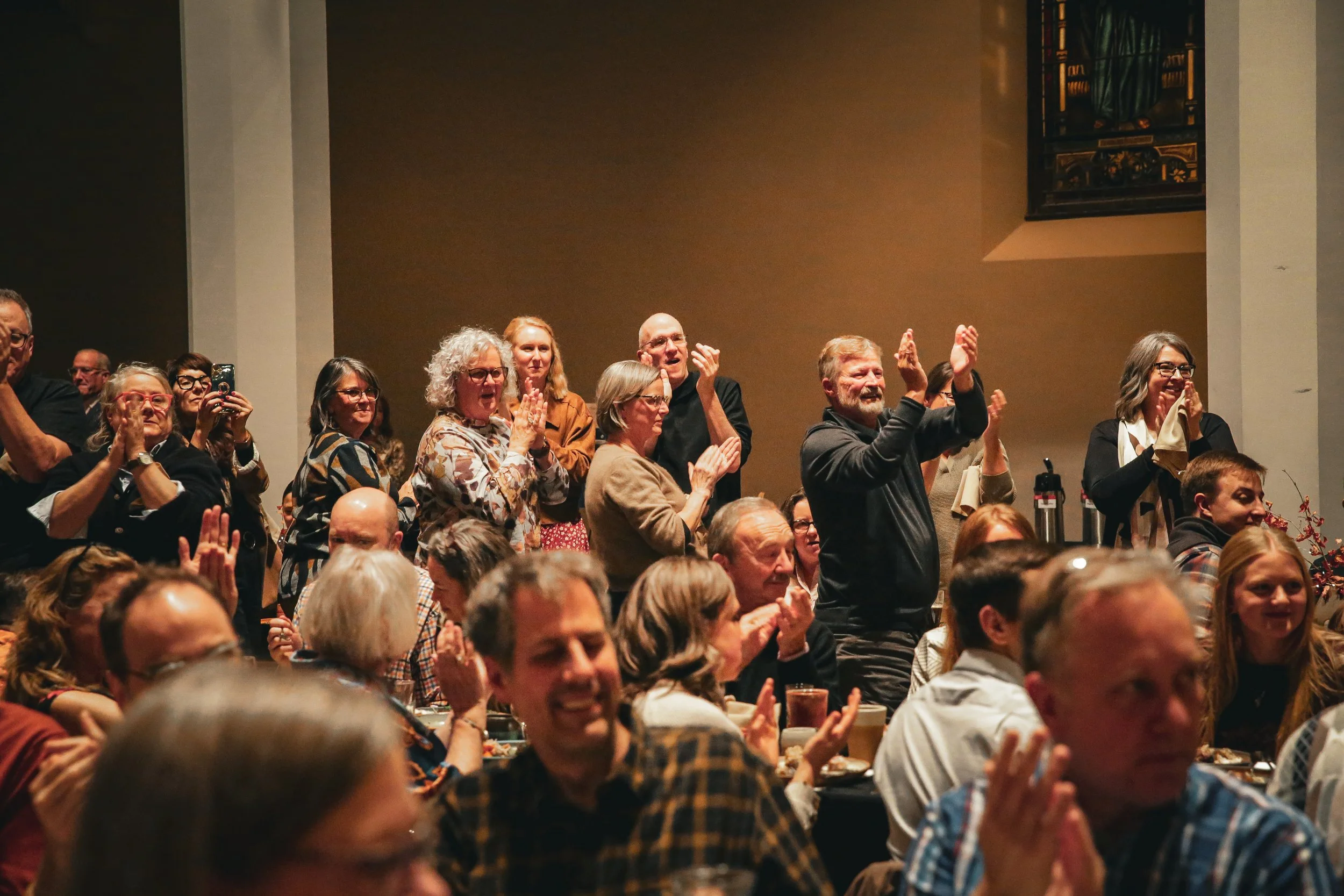 Story Feast Collective featured in Minnesota Monthly and press coverage of immersive pop-up dining experience at St. John's Abbey — communal dining event with 180 guests