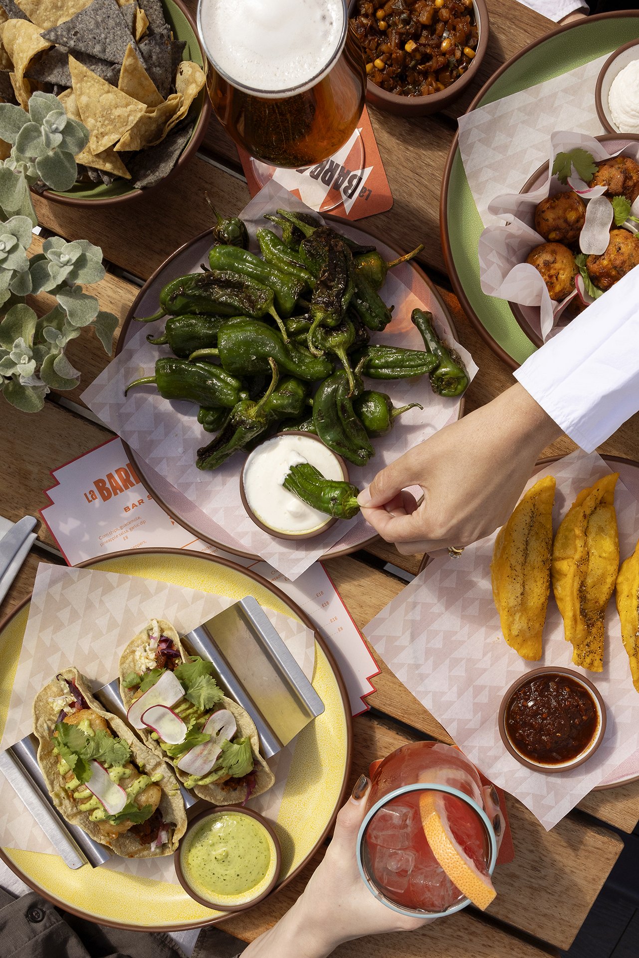 A shared table of food shot from above by Edinburgh food photographer Susie Lowe, who joins Jody Eddy's cookbook writing workshop