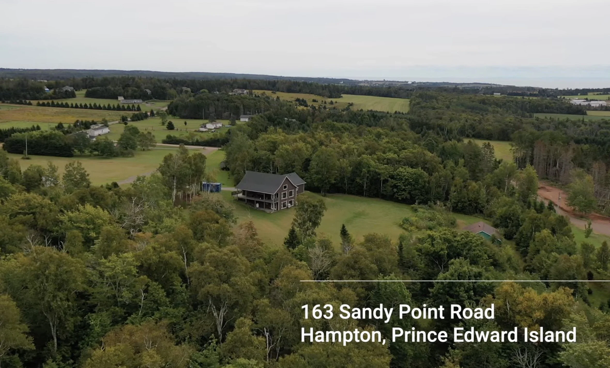 HOUSE AND ADDRESS WIDE SHOT.jpg