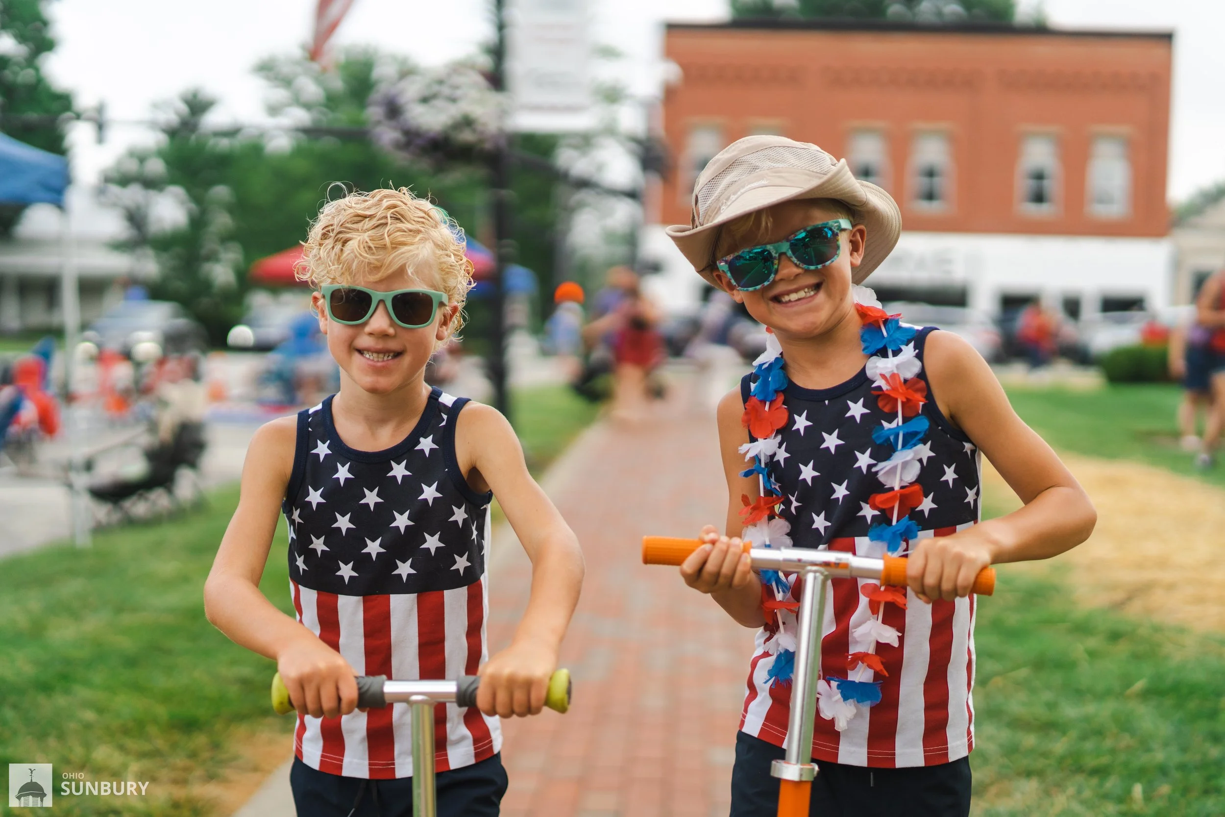 two kids on scooters.jpg