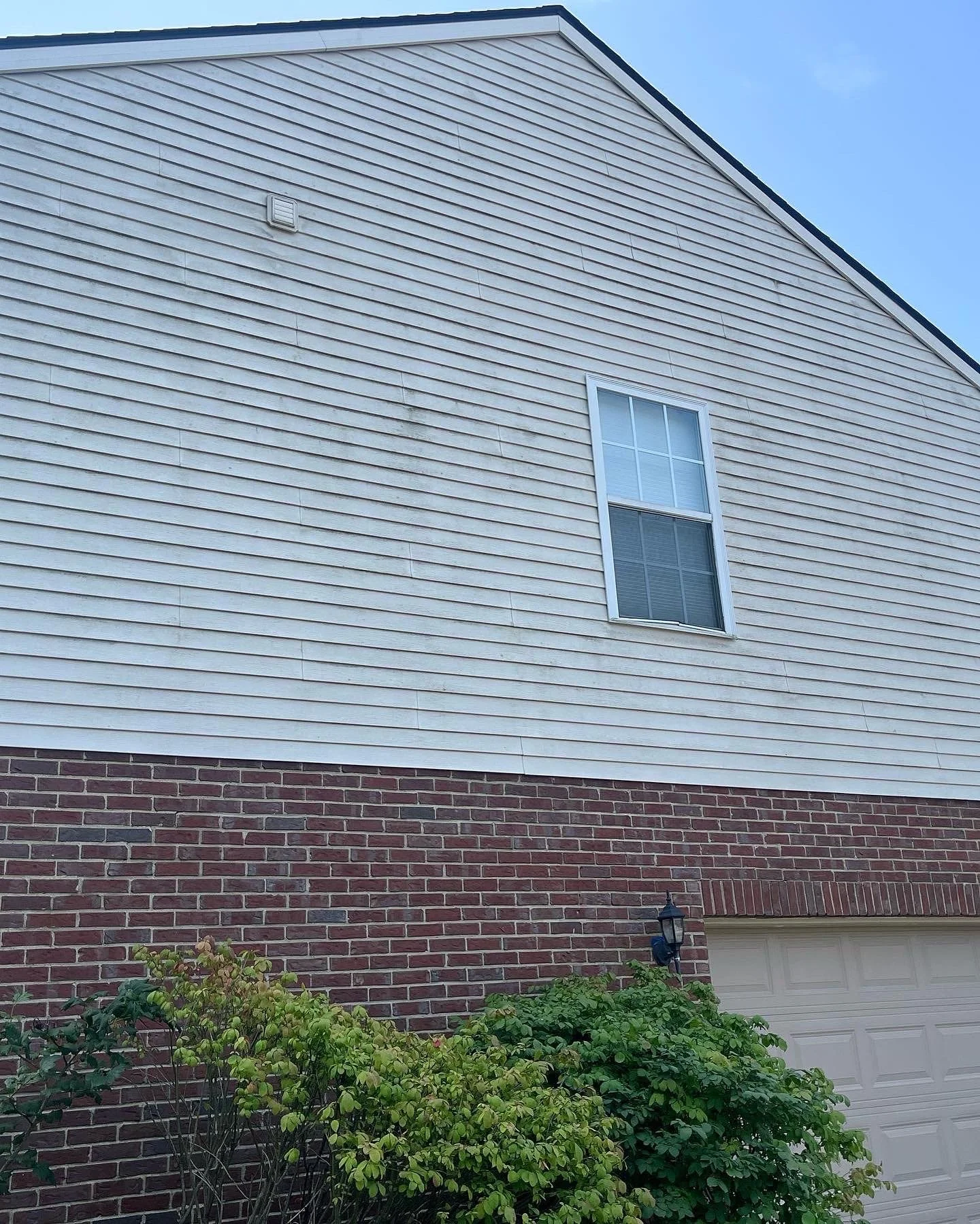 Exterior Power Wash + Driveway Cleaning