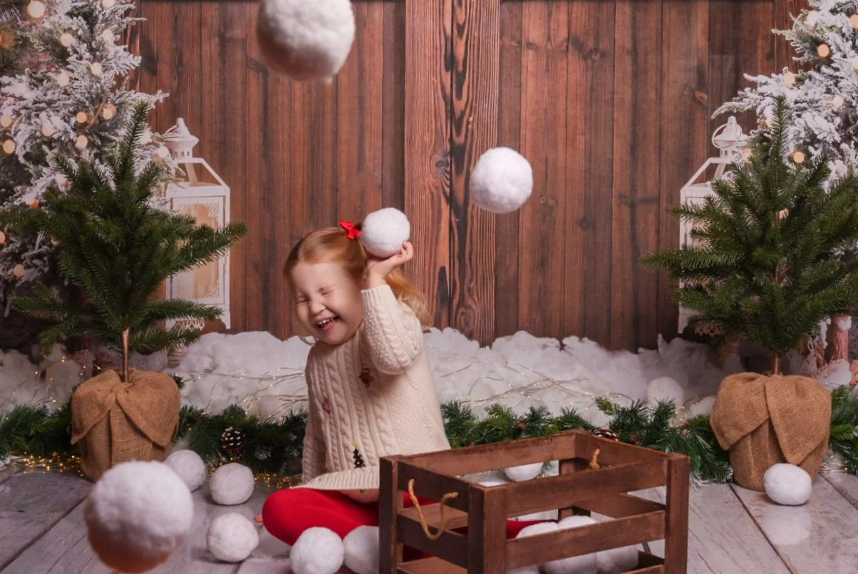 a-little-girl-is-playing-with-a-wooden-box.jpg