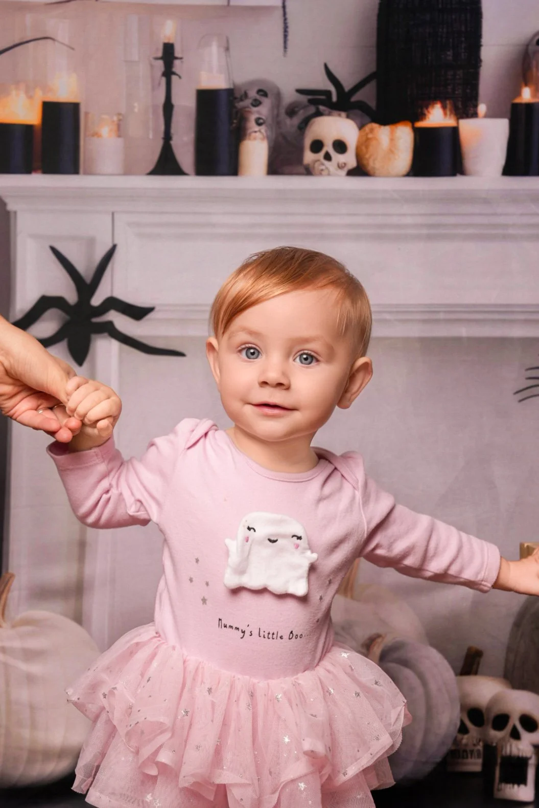 a-little-girl-in-a-pink-dress-is-holding-a-white-cat.jpg
