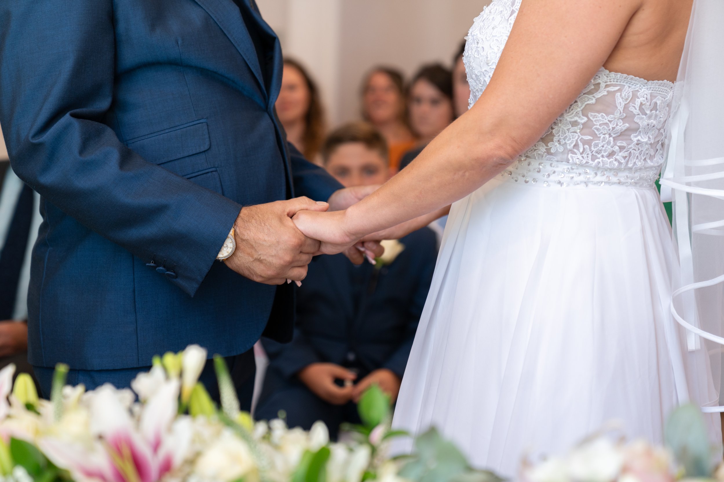 a-man-and-woman-holding-hands.jpg