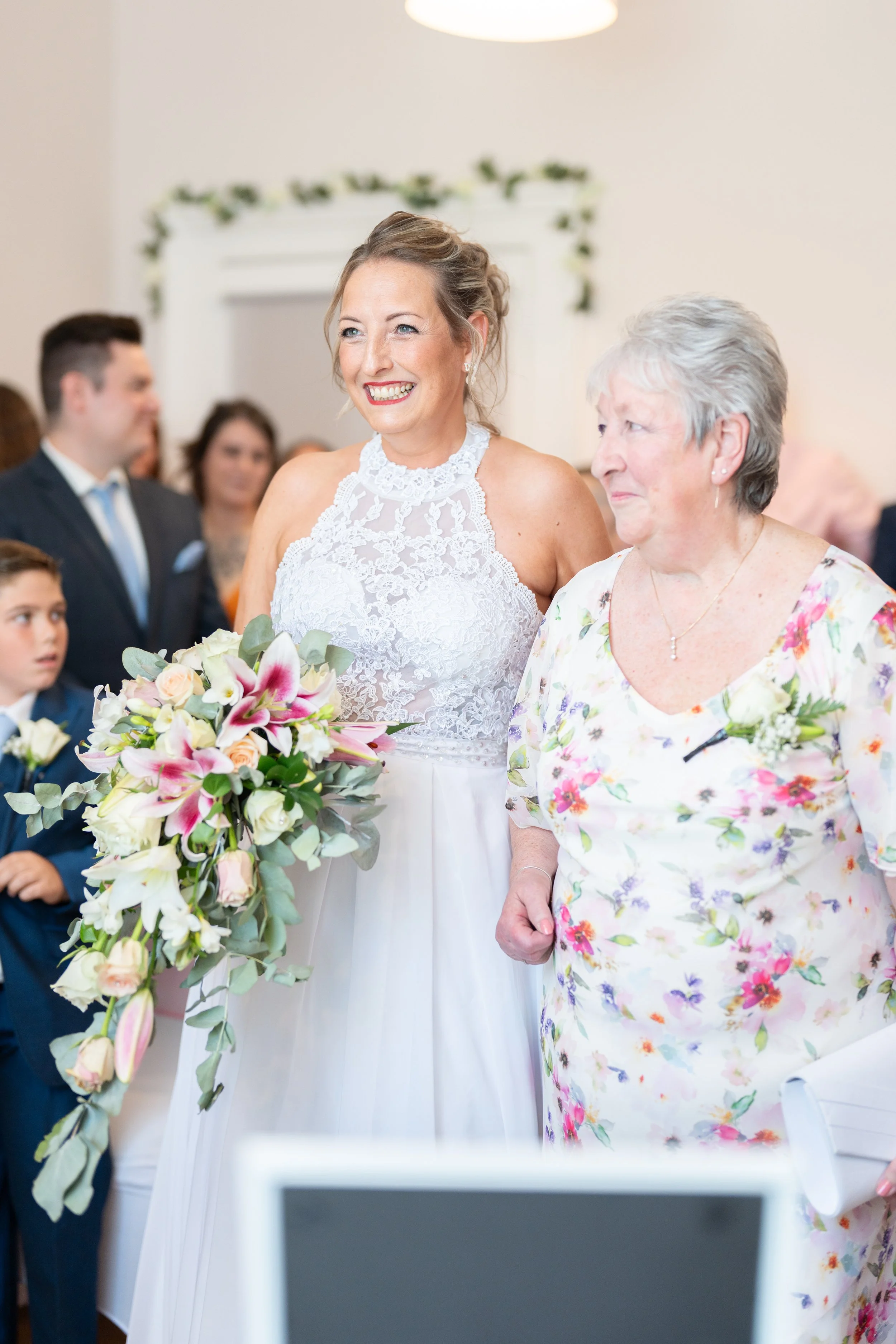 a-bride-and-her-mother-walking-down-the-aisle.jpg