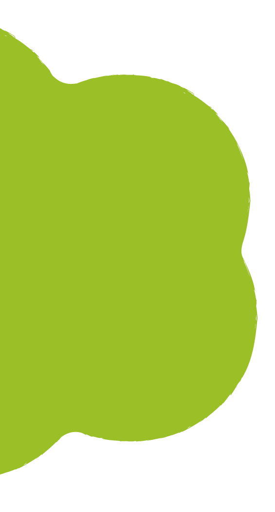 Close-up of a green apple with a portion cut out, set against a black background.