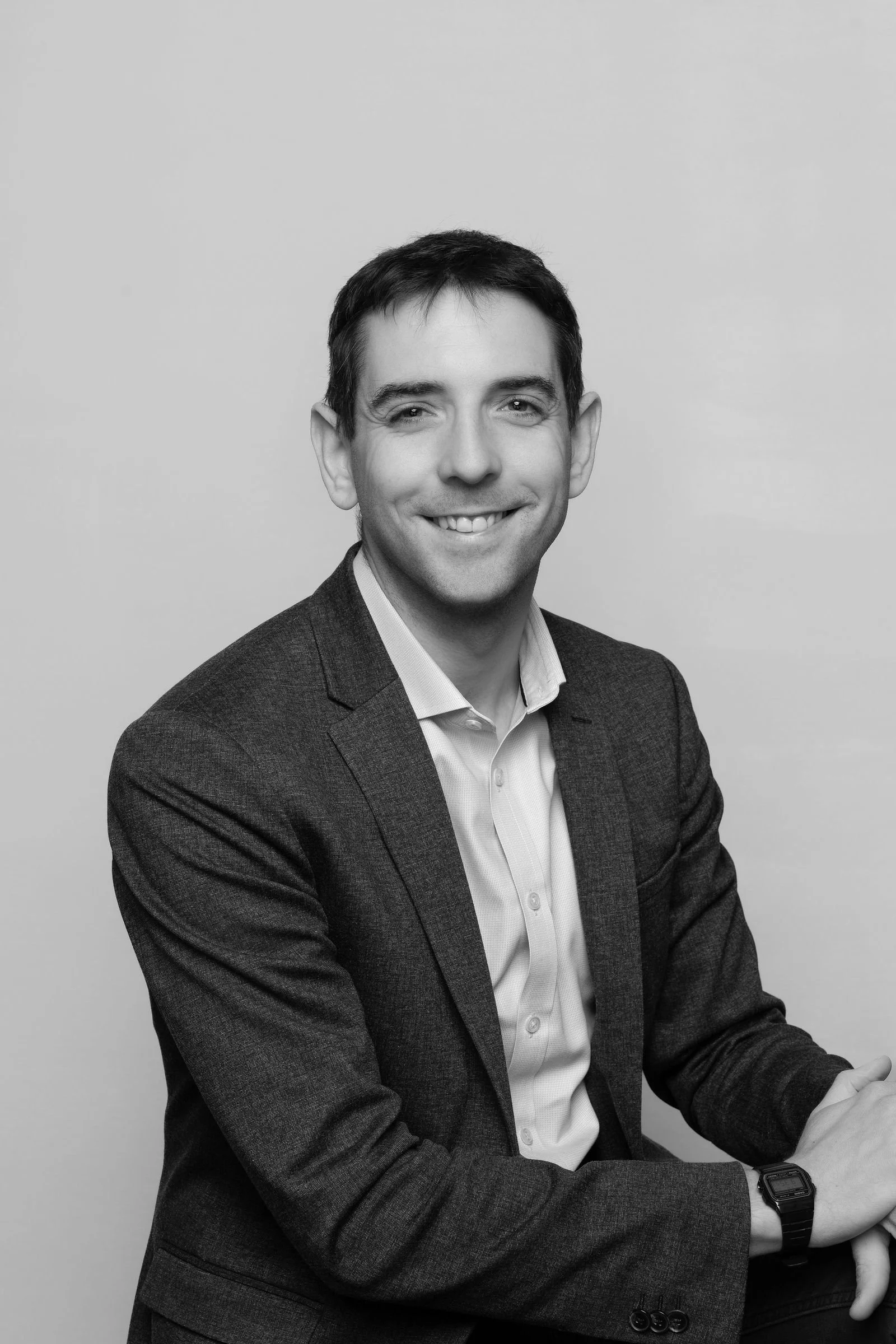 Studio Headhshot of a man in a suit