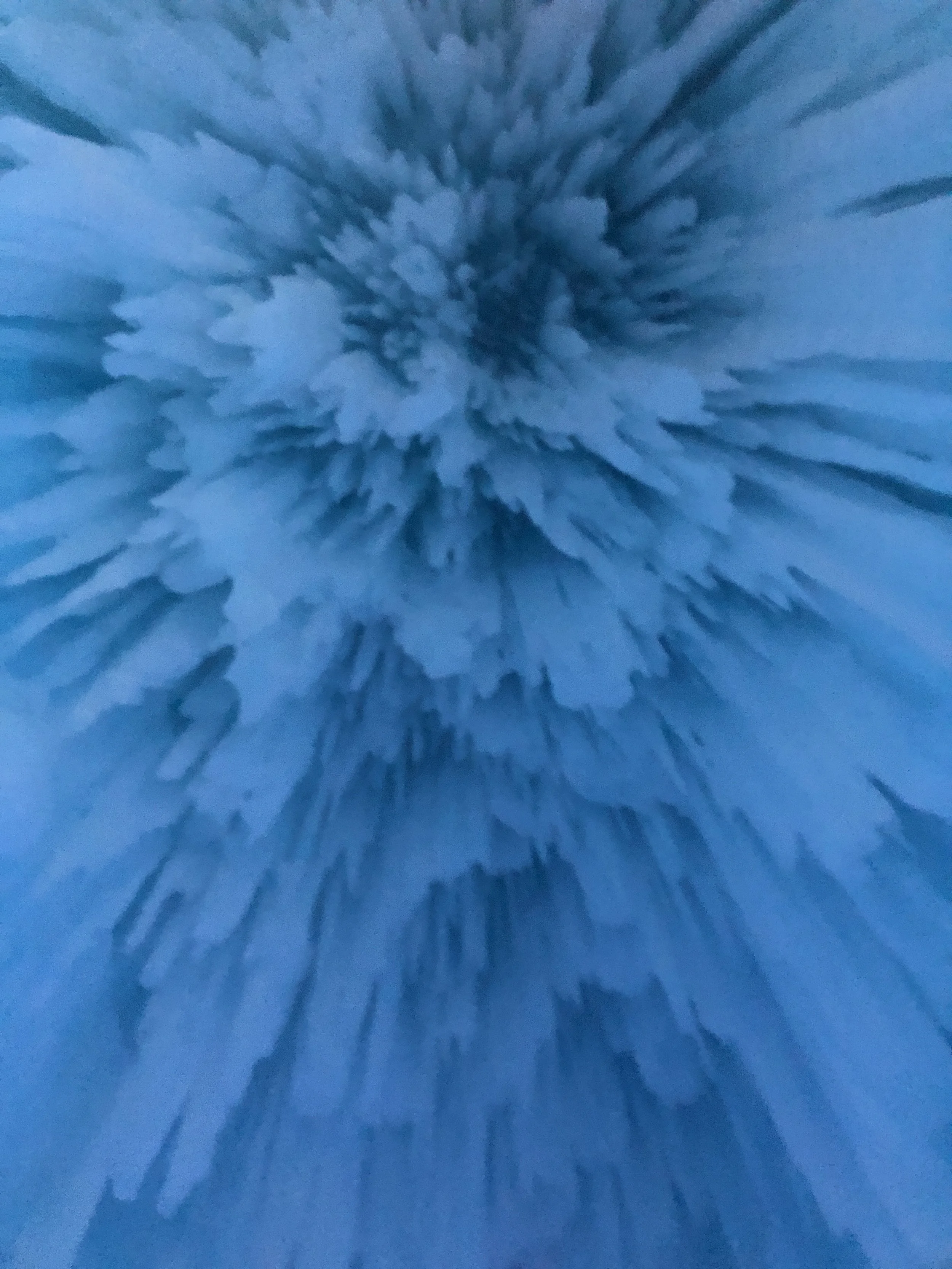 Blue clouds or powder explosion creating a cloud burst effect.