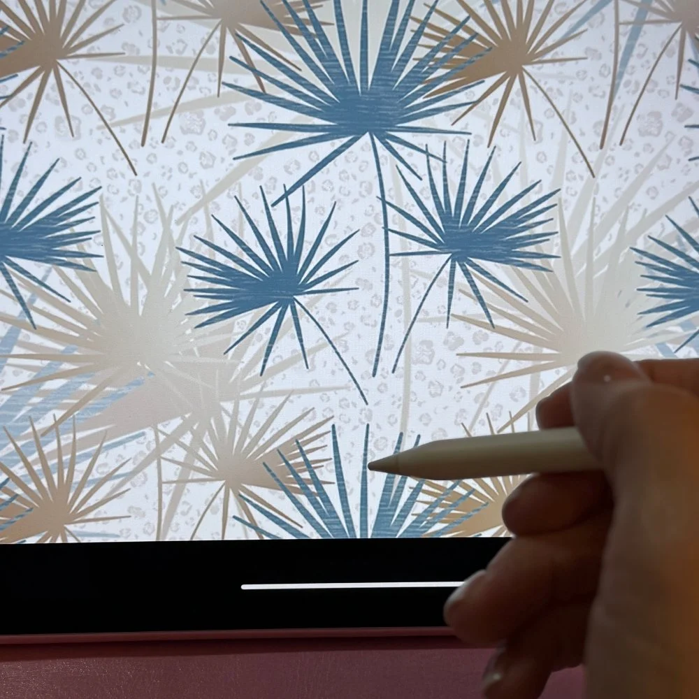 Close-up of repeat pattern artwork being refined on a tablet during an art licensing collaboration process