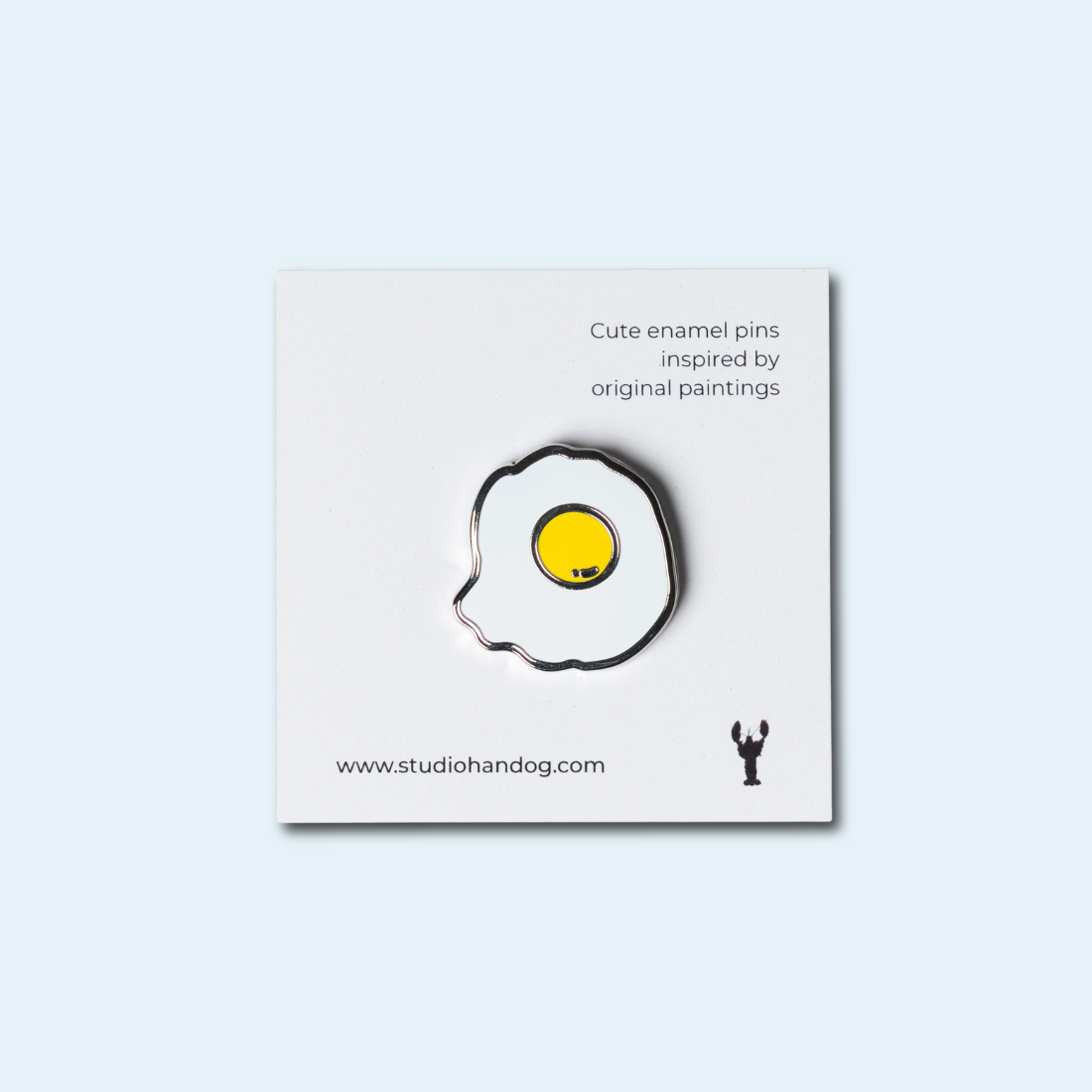 Studio Handog Fried Egg Enamel Pin with backing.png