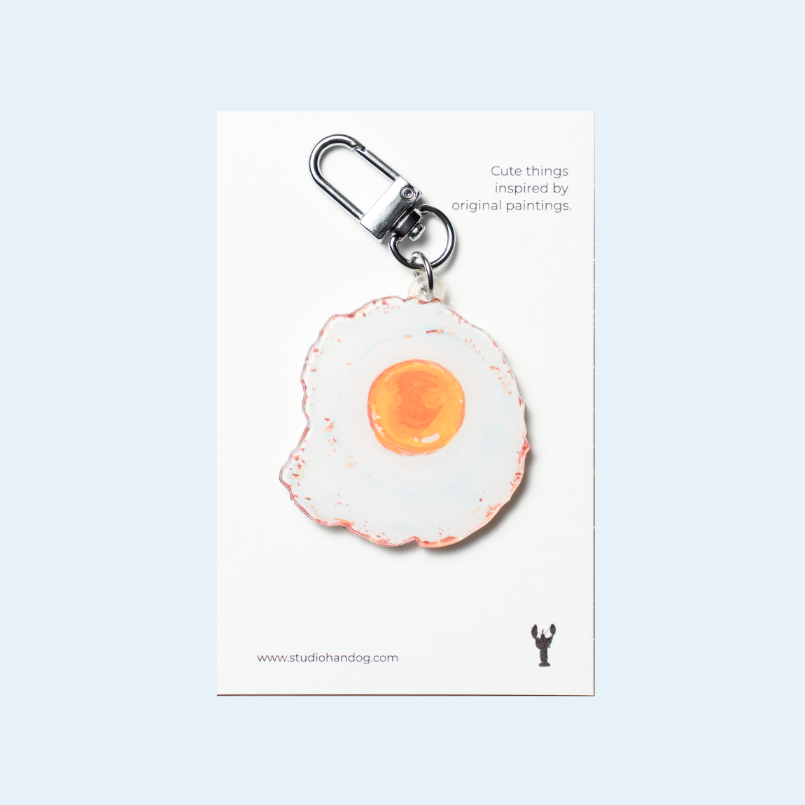 Studio Handog Fried Egg Acrylic Keychain with backing.png