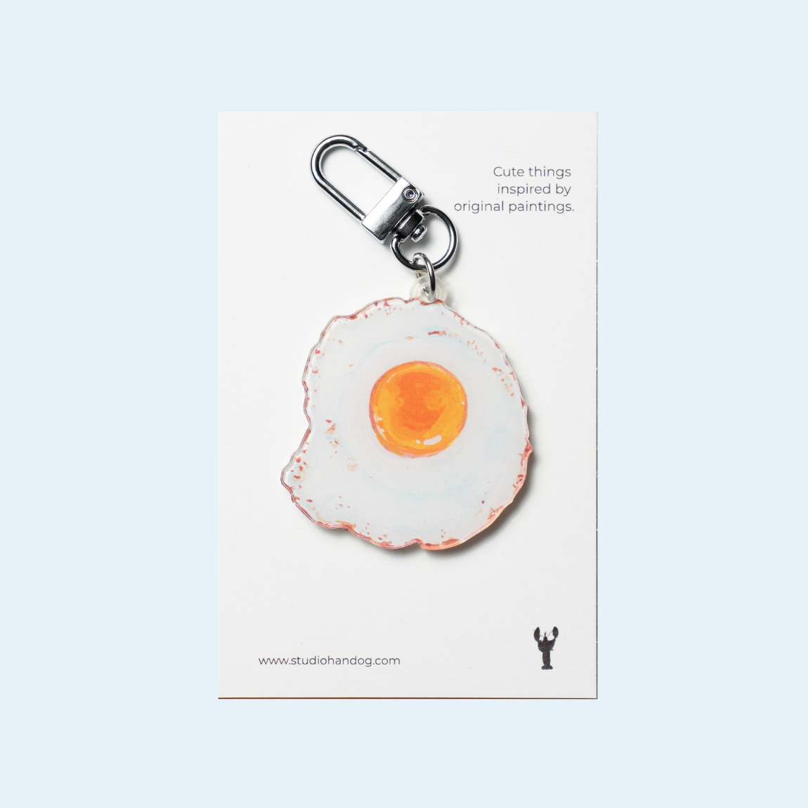 Studio Handog Fried Egg Acrylic Keychain with backing.png