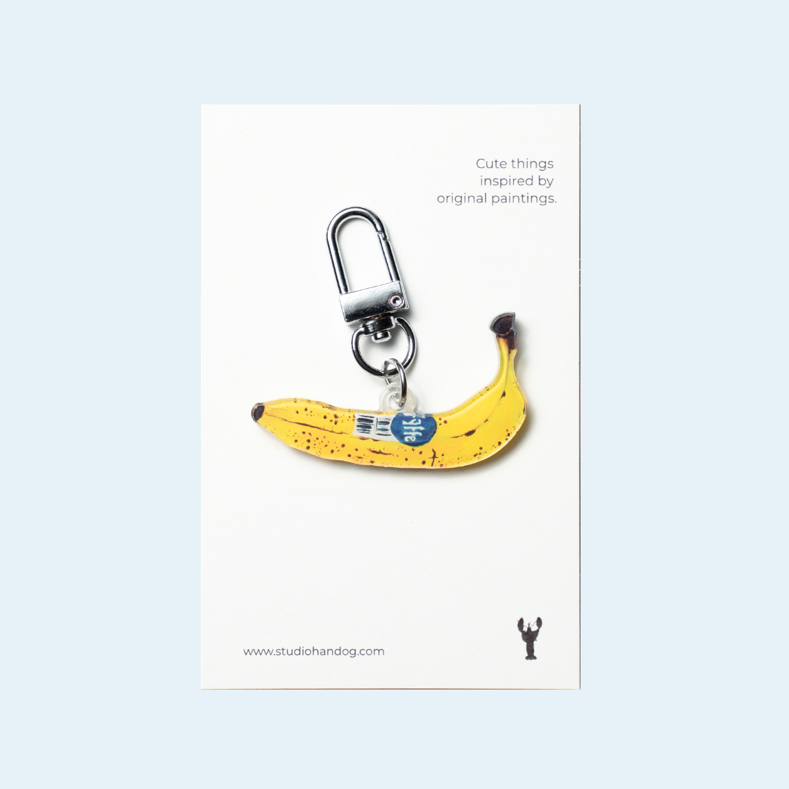 Studio Handog Banana Acrylic Keychain with backing.png