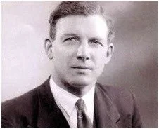 Black and white portrait of Dr Oliver Fisher pioneer of neonatal care in Kent