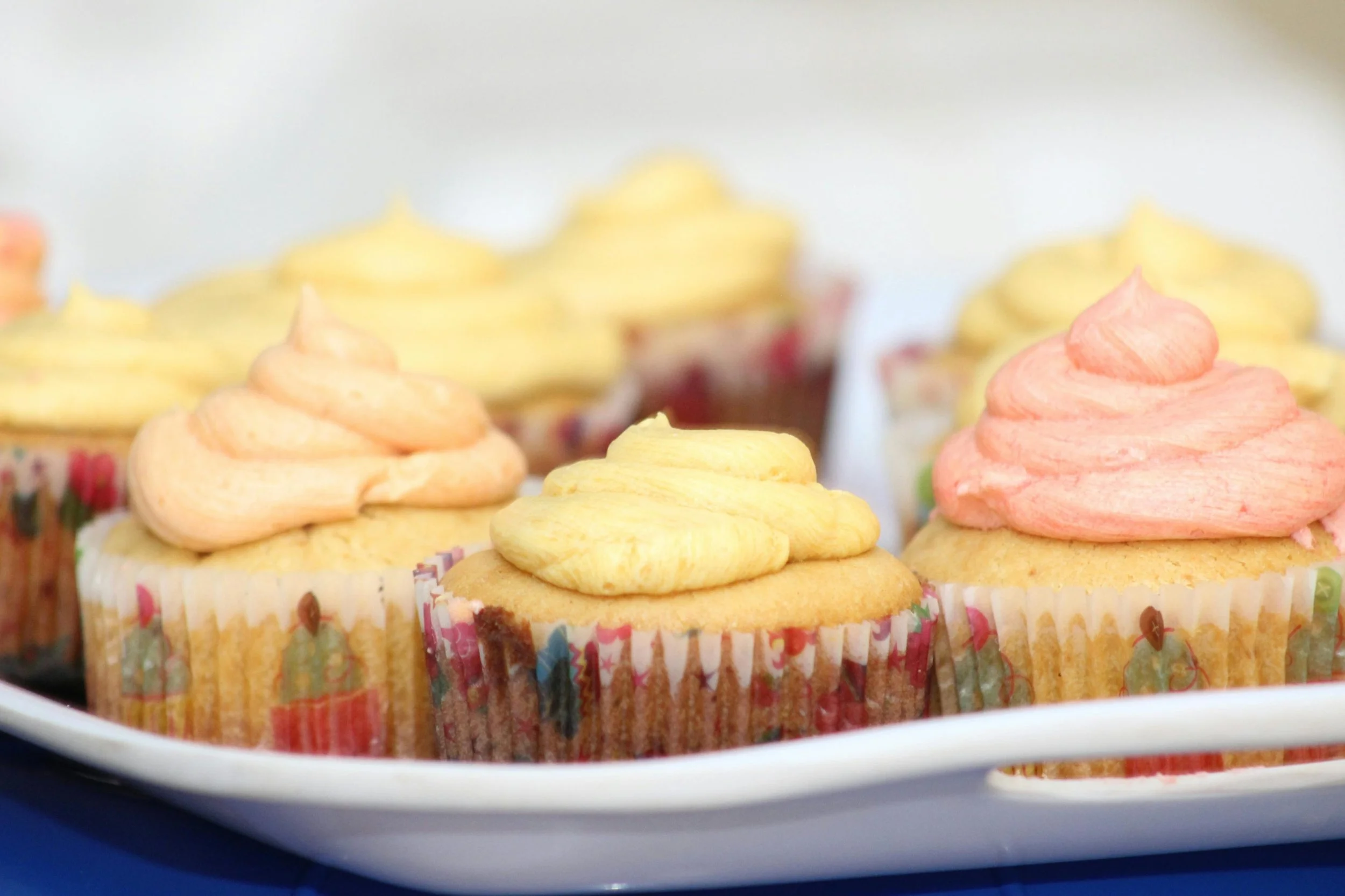 Decorated cupcakes displayed on plate