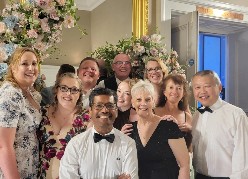 The Oliver Fisher Special Care Baby Trust trustees smiling together at charity event