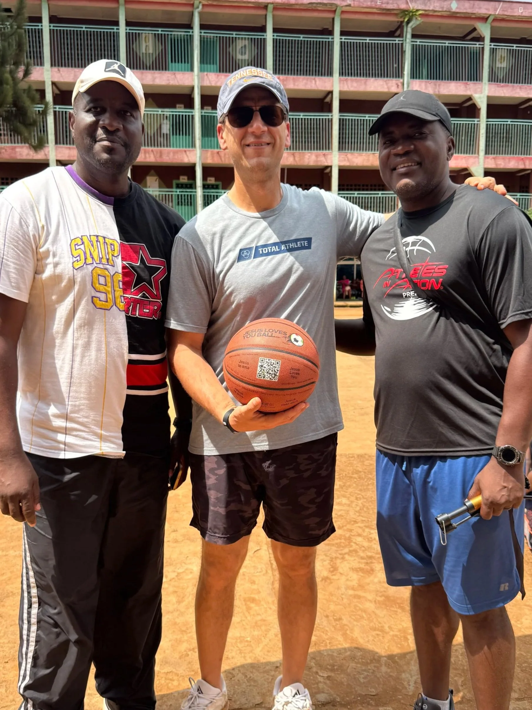 coaches at an outdoor court