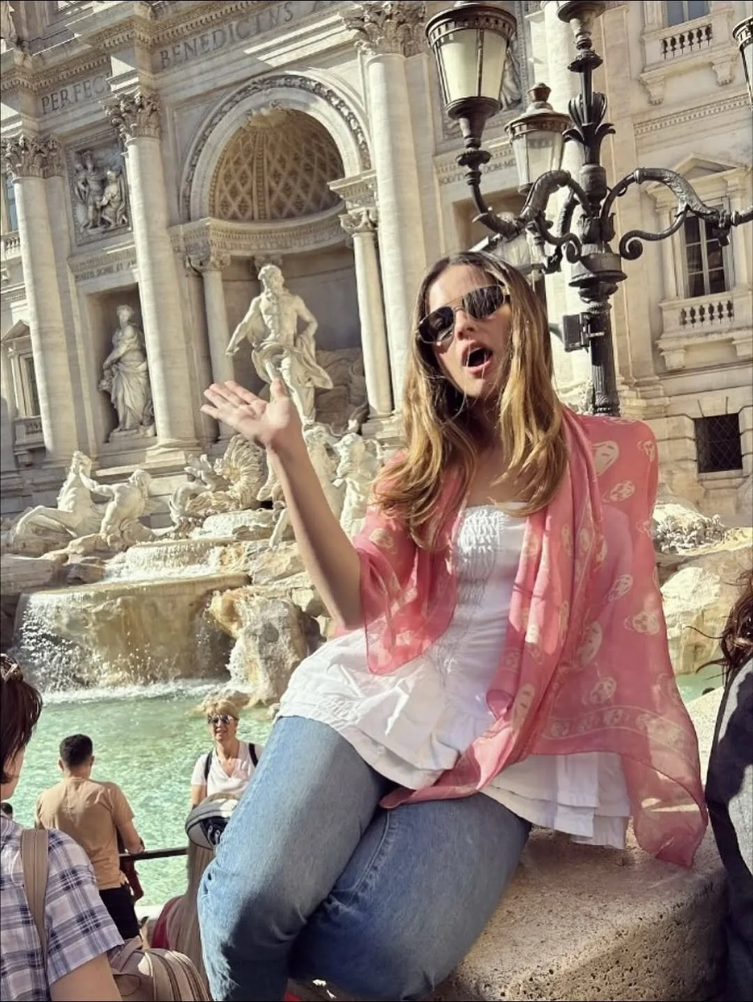 Addison Rae wearing Alexander McQueen skull scarf