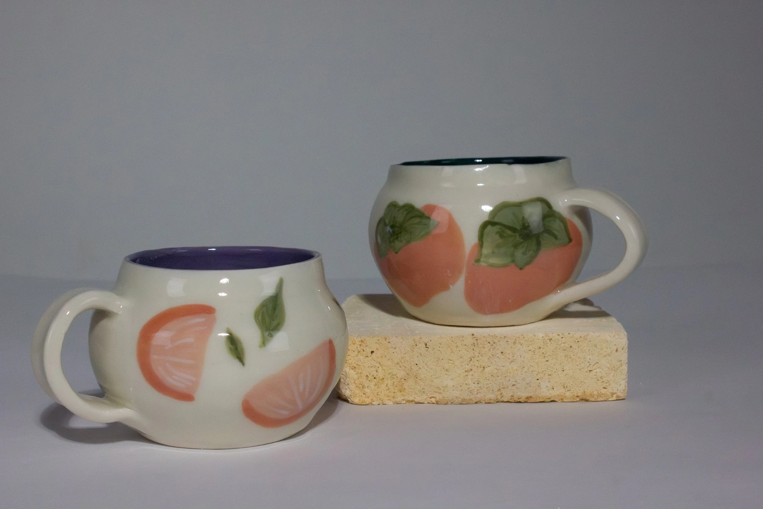 "Orange Slices" (Left) and "Persimmon Mug" (Right), 2026 (Front)