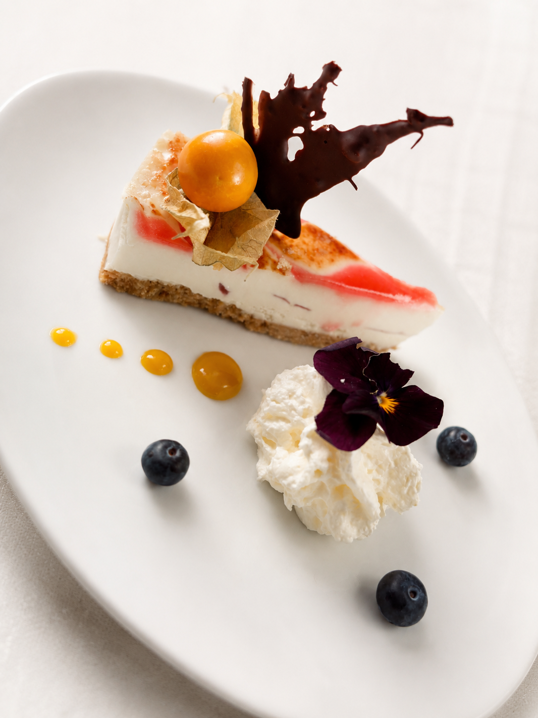 White Chocolate and Raspberry Brûlée Cheesecake.