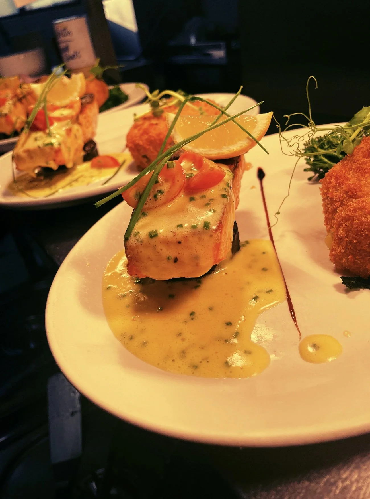Darne of Salmon with a Chive and Tomato Beurre Blanc with a Parmesan and Spinach Croquette