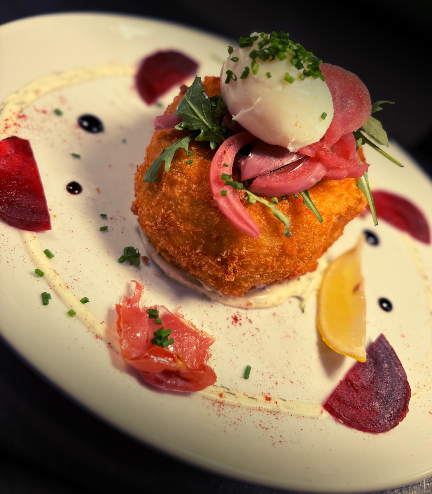 Salmon and Spinach Fishcake, with carpaccio of Beetroot, Lemon and Dill Mayonnaise, Pickled Red Onion and Poached Onsen style Egg