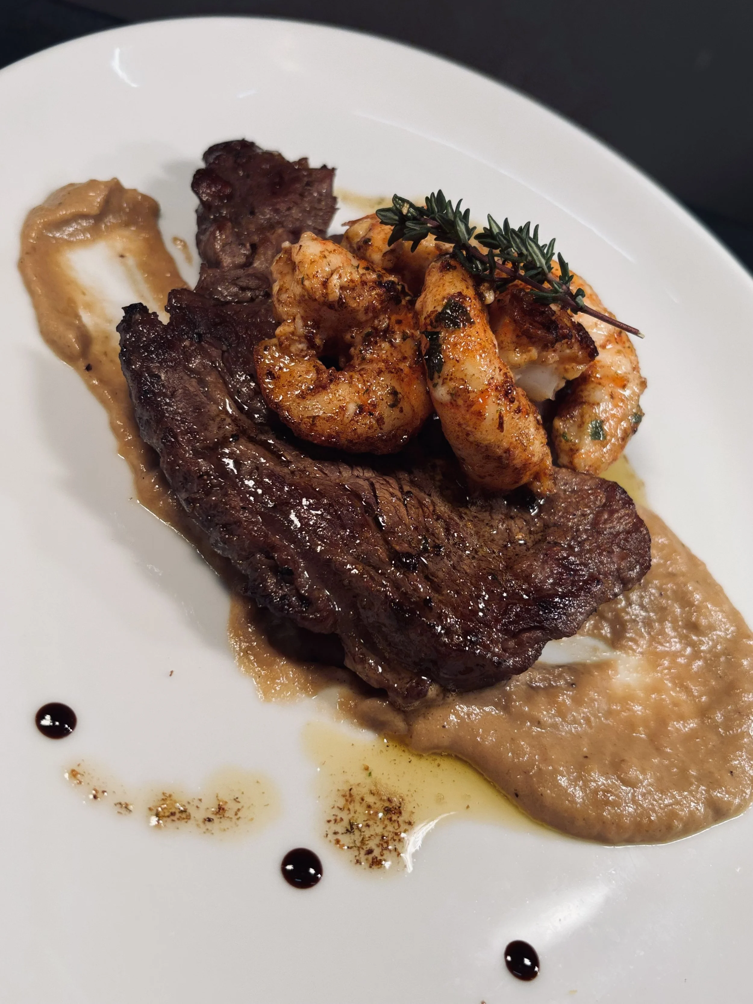 Surf and Turf - Rib Eye Steak, Garlic Prawns, Onion Purée