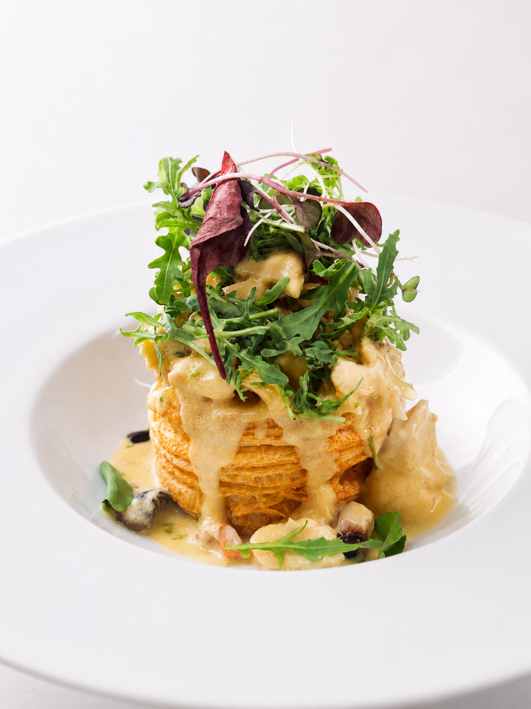 Chicken, Mushroom and Bacon Vol au Vent in a Creamy White Wine sauce.