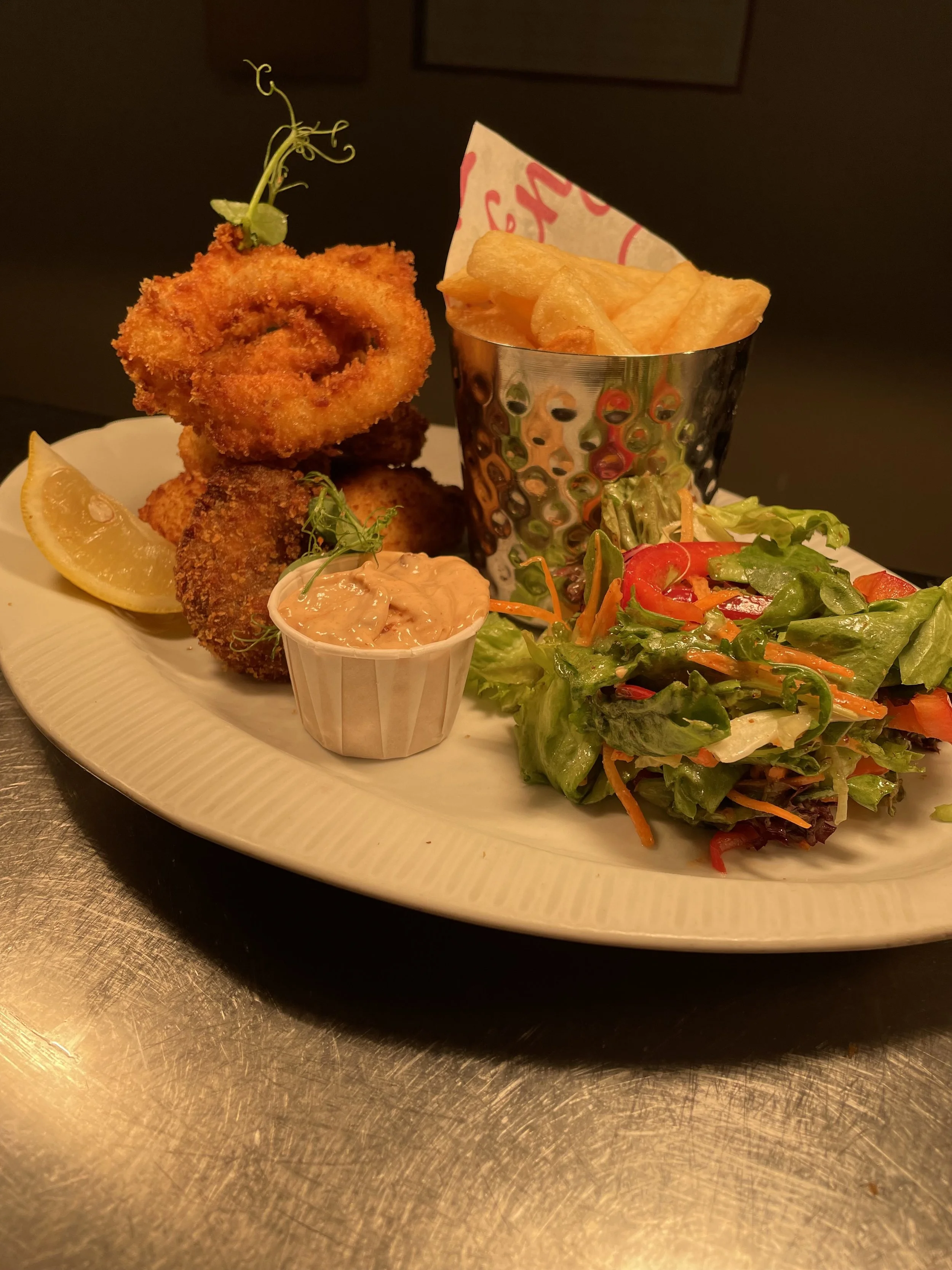 Battered Trio of Seafood, Prawns &  Squid and Monkfish.
