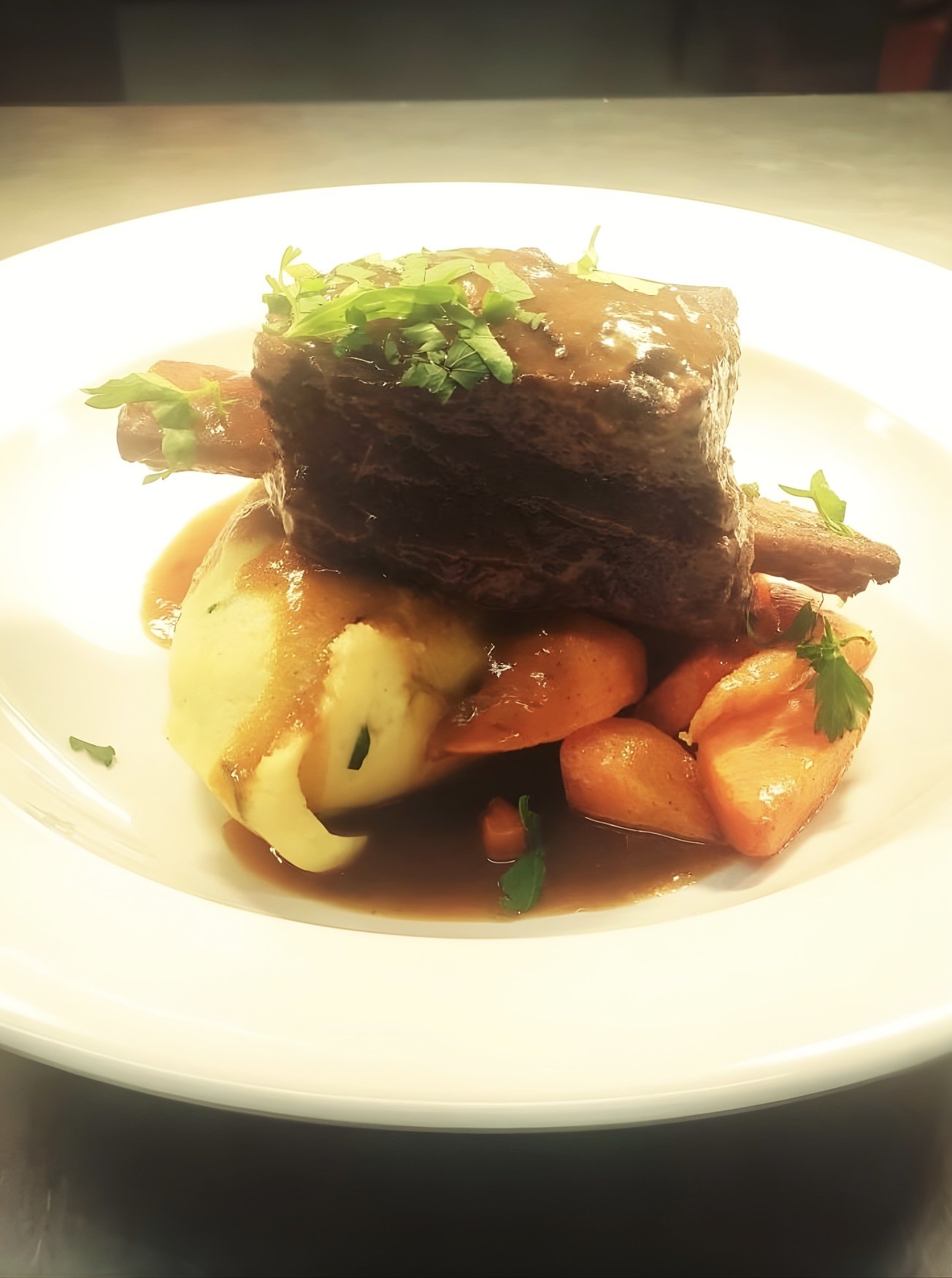Braised Short Rib of Beef on a bed of Champ