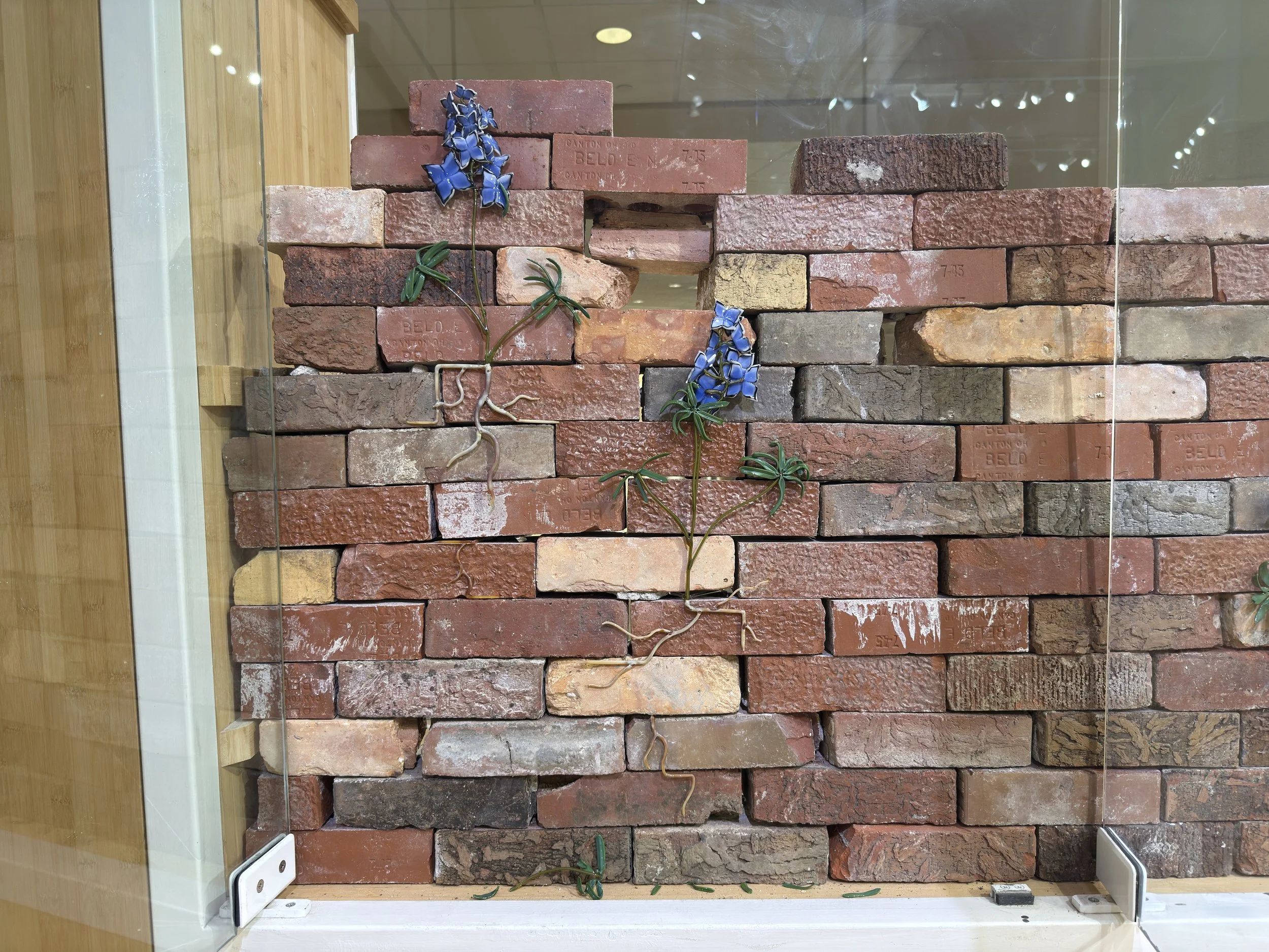 Encroachment, borosilicate glass, found brick, 69" x 10" x 34", 2025