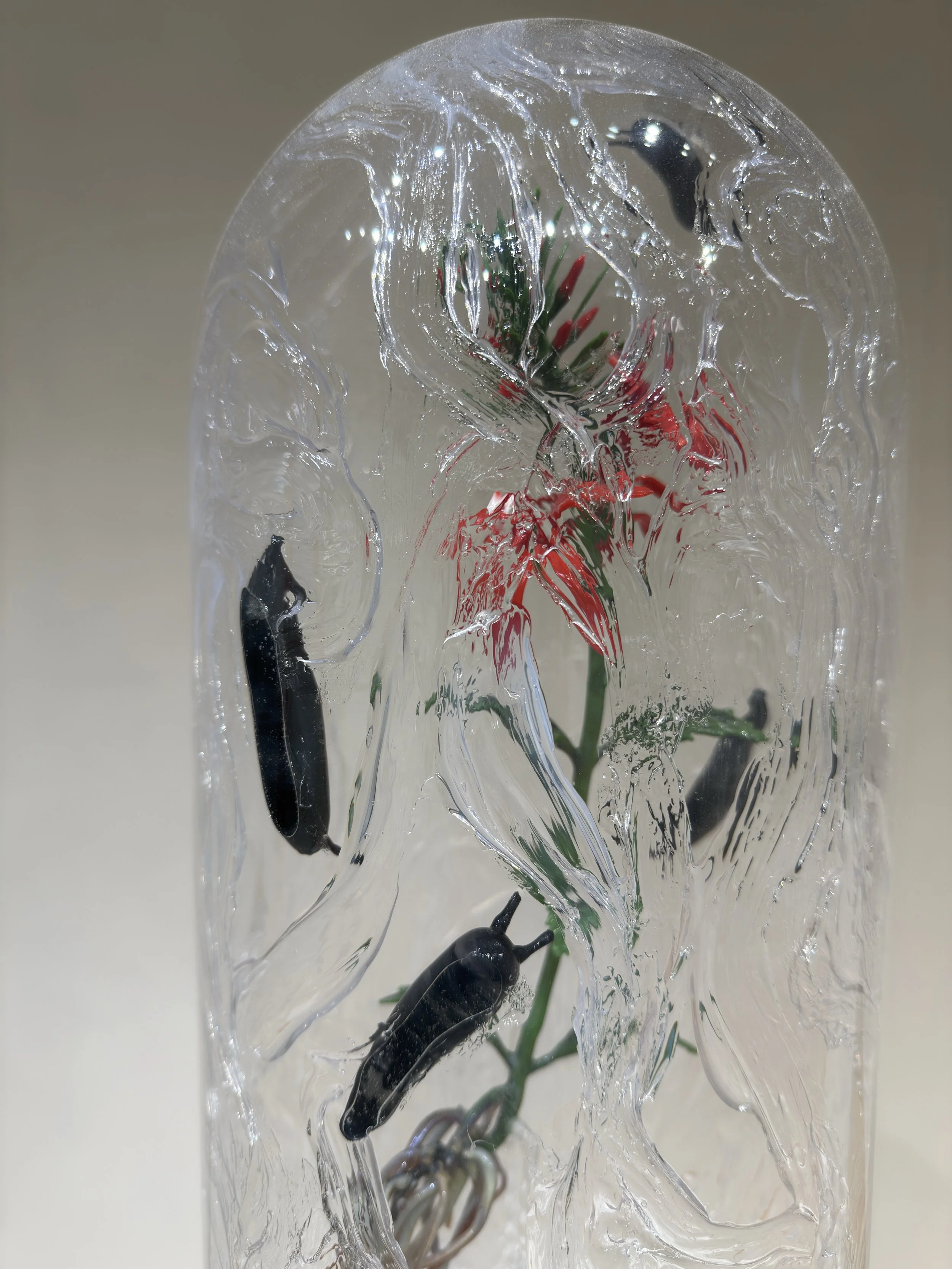 Suffering Native, borosilicate glass, found glass, silicon, wood, paint, 12" x 12" x 21", 2025