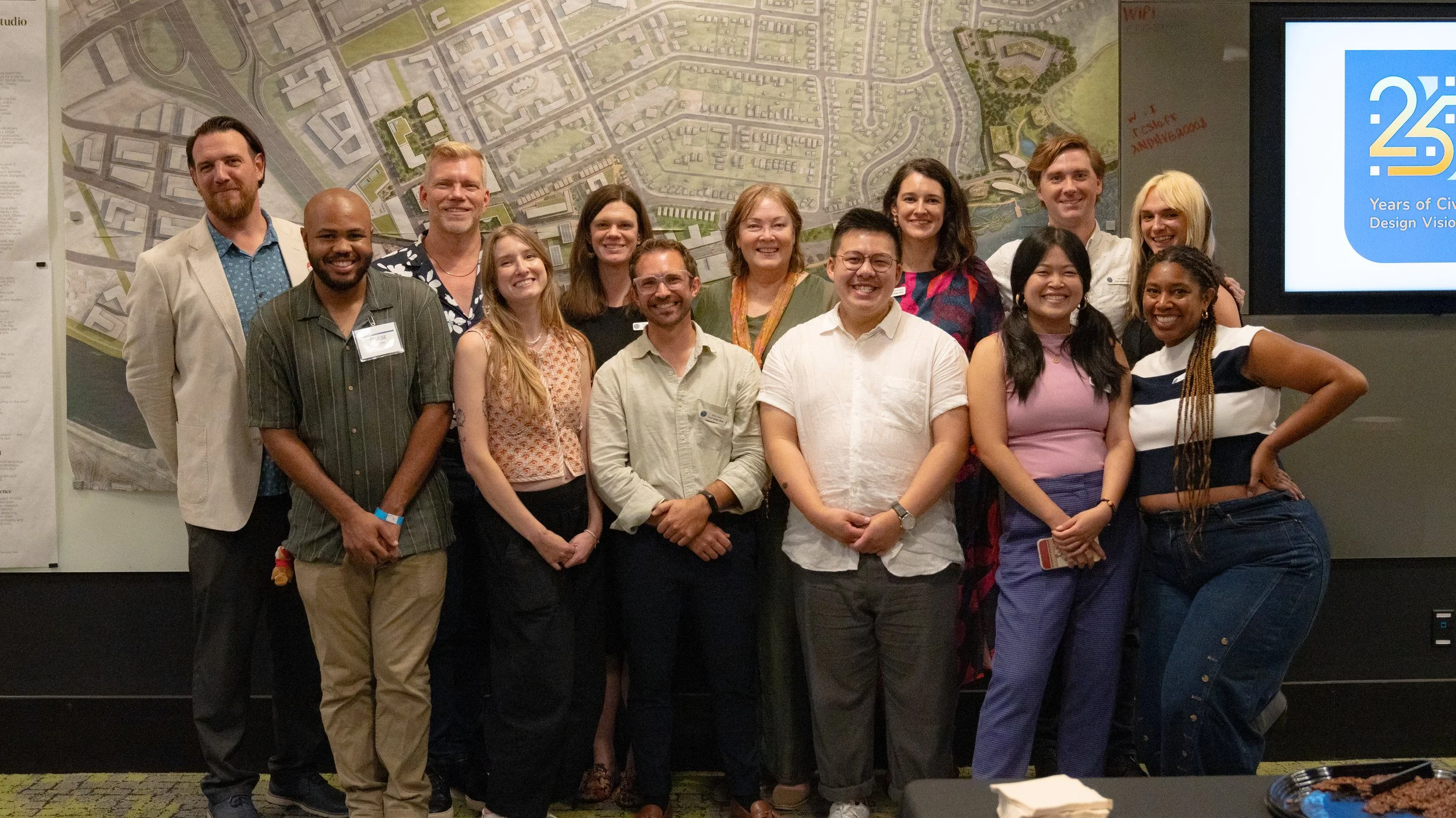 The Civic Design Center staff team posing for a group photo at the Civic Design Center's 25th anniversary celebration