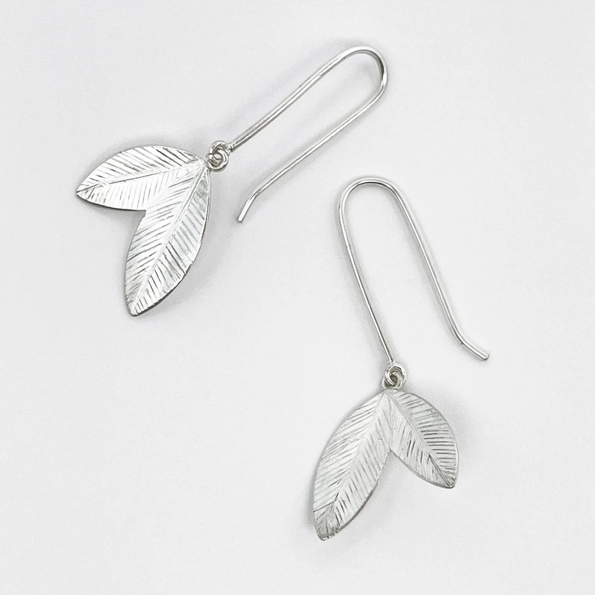 LeafSignet2EarringwHooks_laying.jpg