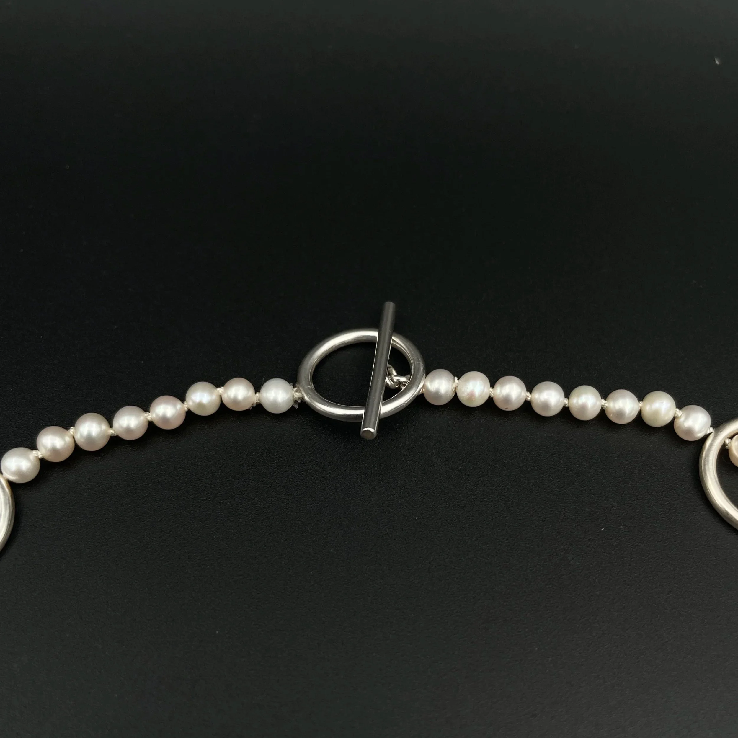 PearlRingNecklace_detailofClaspBlack.jpg