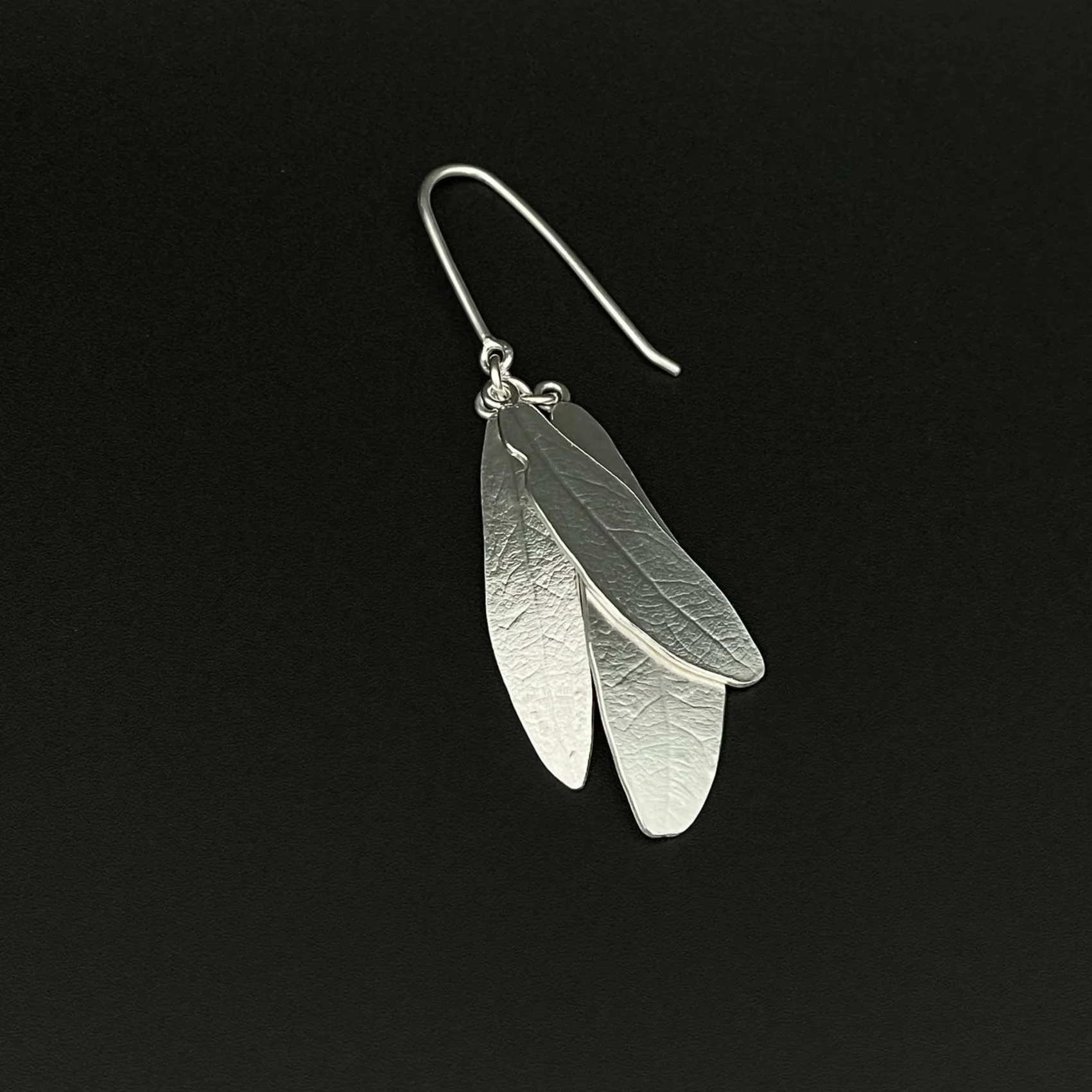 Leaves3EarringwHooks_layingBlack1.jpg